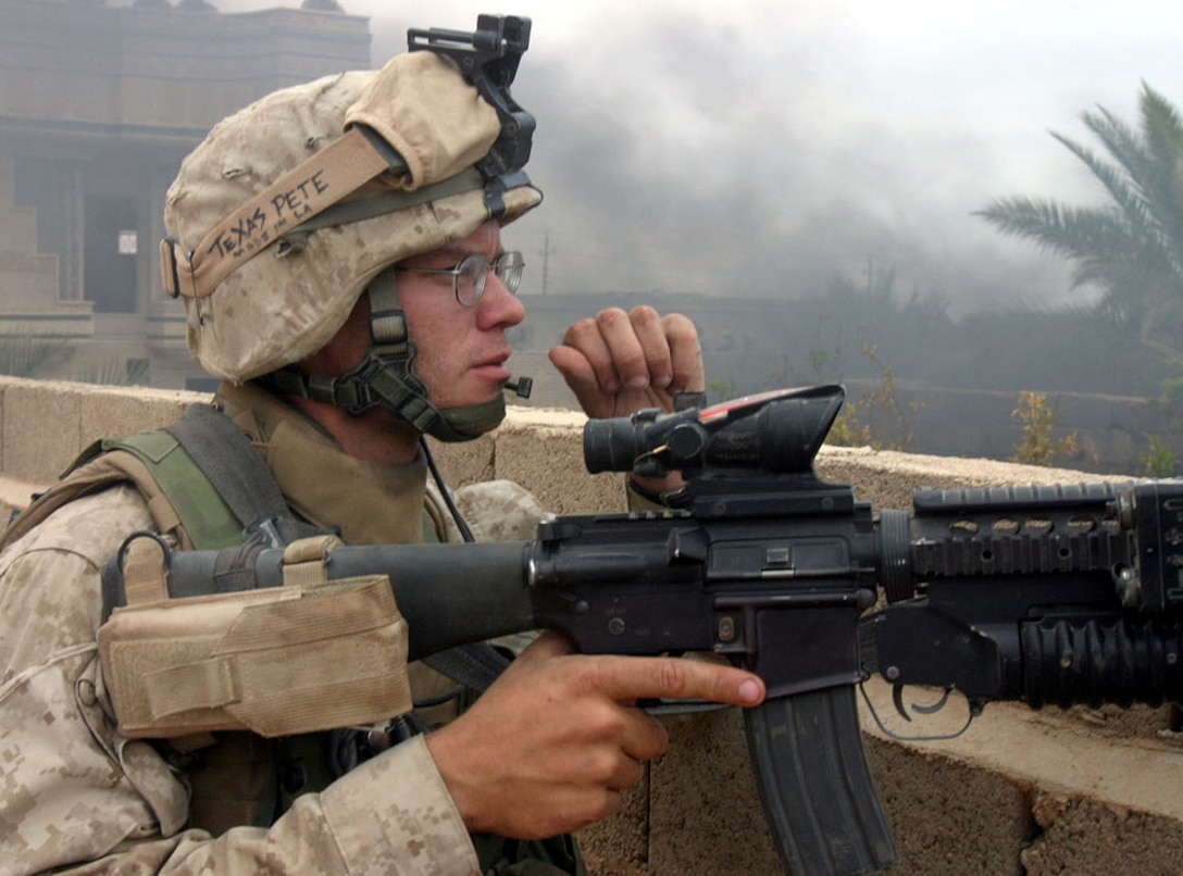Corporal John Kennedy of Company I, 3rd Battalion, 6th Marine Regiment, stands watch during a lull in the fighting Nov. 8, 2005 in Husaybah, Iraq, during Operation Steel Curtain ? an 18-day operation last November which saw hundreds of insurgents killed or captured in the cities of Husaybah and Karabilah. After spending seven months of routing out insurgents and stabilizing the Al Qa?im region, located along the Euphrates River in northwestern Al Anbar Province near the Syrian border, the Camp Lejeune, N.C.-based Marines say they?re leaving the region in better shape then when they arrived last year. During the past seven months, the Marines have brought stability back to the people of western Iraq by training Iraqi Army soldiers and ridding the region of anti-Iraqi forces, thanks to an aggressive counterinsurgency campaign, which included Operation Steel Curtain last November - a major offensive to disrupt insurgent activity along the Syrian border which saw hundreds of insurgents killed or captured. ?We're able to progress now with getting consistent (electrical) power, free and clean running water for all the villages up there, as well as starting to rebuild the hospitals and the schoolhouses that have suffered over the last three years,? said Col. Stephen W. Davis, who commanded all Marine forces in western Al Anbar Province for the past year, during a Pentagon press briefing last month. The battalion?s redeployment to the U.S. is part of a regularly scheduled rotation of forces in Al Anbar. More than 25,000 Marine and sailors of Camp Pendleton, Calif.-based I Marine Expeditionary Force are replacing the Camp Lejeune, N.C.-based II MEF. (Official U.S. Marine Corps photo by Sgt. Jerad W. Alexander)