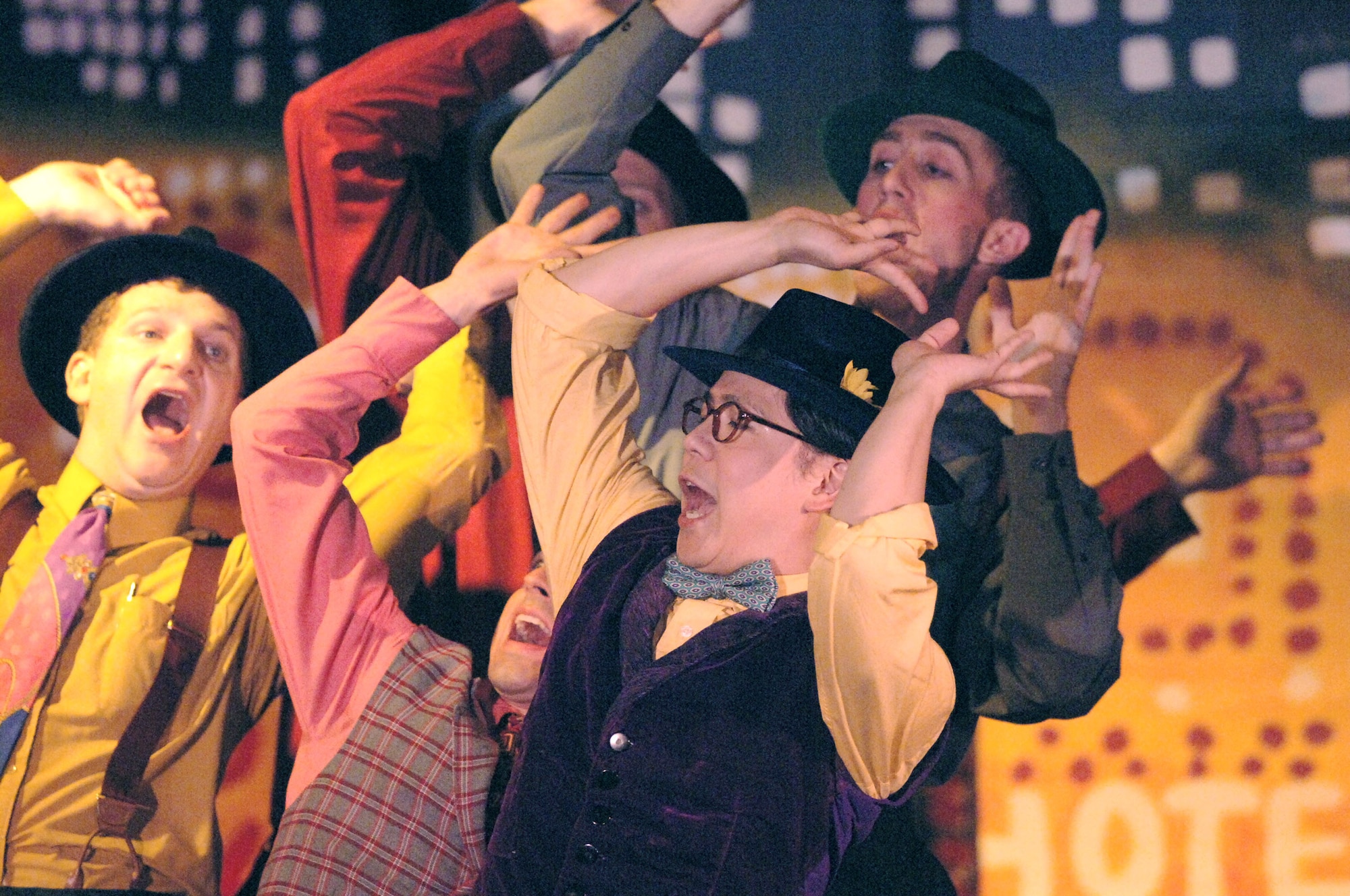 YOKOTA AIR BASE, Japan (AFPN) -- Members of the Yokota Players perform in a "Guys and Dolls" production here. "Guys and Dolls" tells the story of a group of small-time gamblers and the women in their lives. The Yokota Players provide youths and adults education and experience in theatre and arts. (U.S. Air Force photo by Master Sgt. Val Gempis)