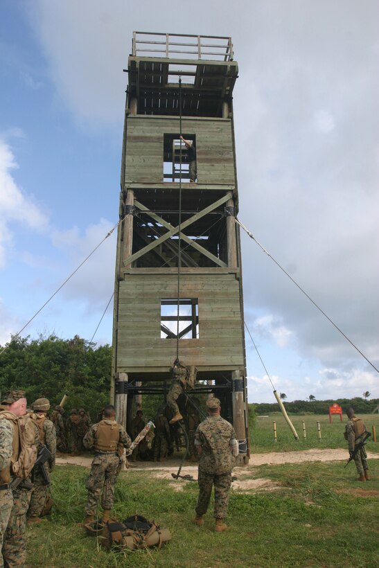 Marines from Lima Company, 3rd Battalion, 3rd Marine Regiment, descend from a tower at LZ Boondocker during Marine Security Element training, Nov. 7.  The Marines are preparing for an upcoming deployment to Iraq.