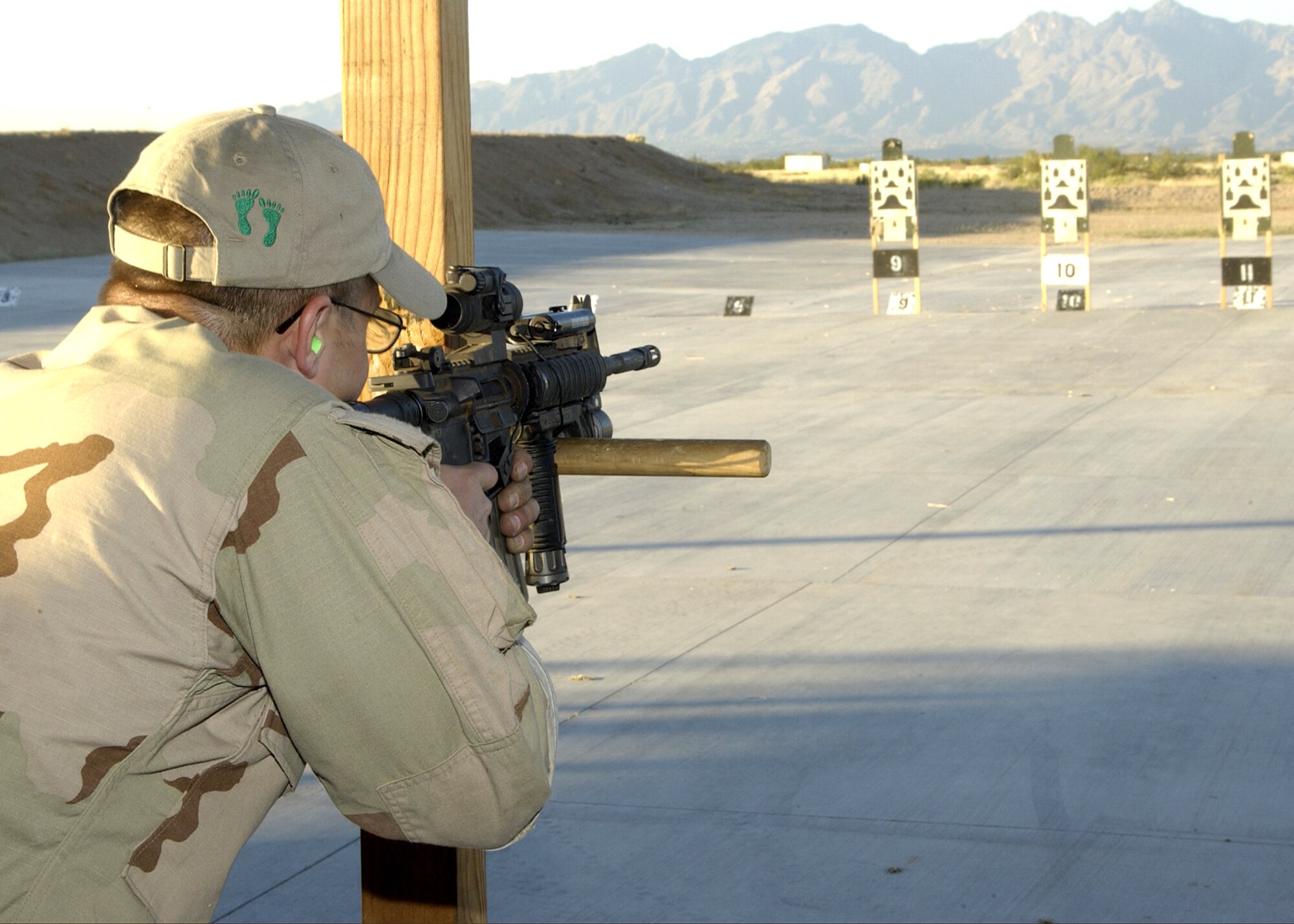 DAVIS-MONTHAN, Ariz. (AFPN) -- Senior Airman Joe Piccoli fires his M-4 rifle target training here.   Airman Piccoli is with the 306th Rescue Squadron. (U.S. Air Force photo by Airman 1st Class Veronica Pierce)