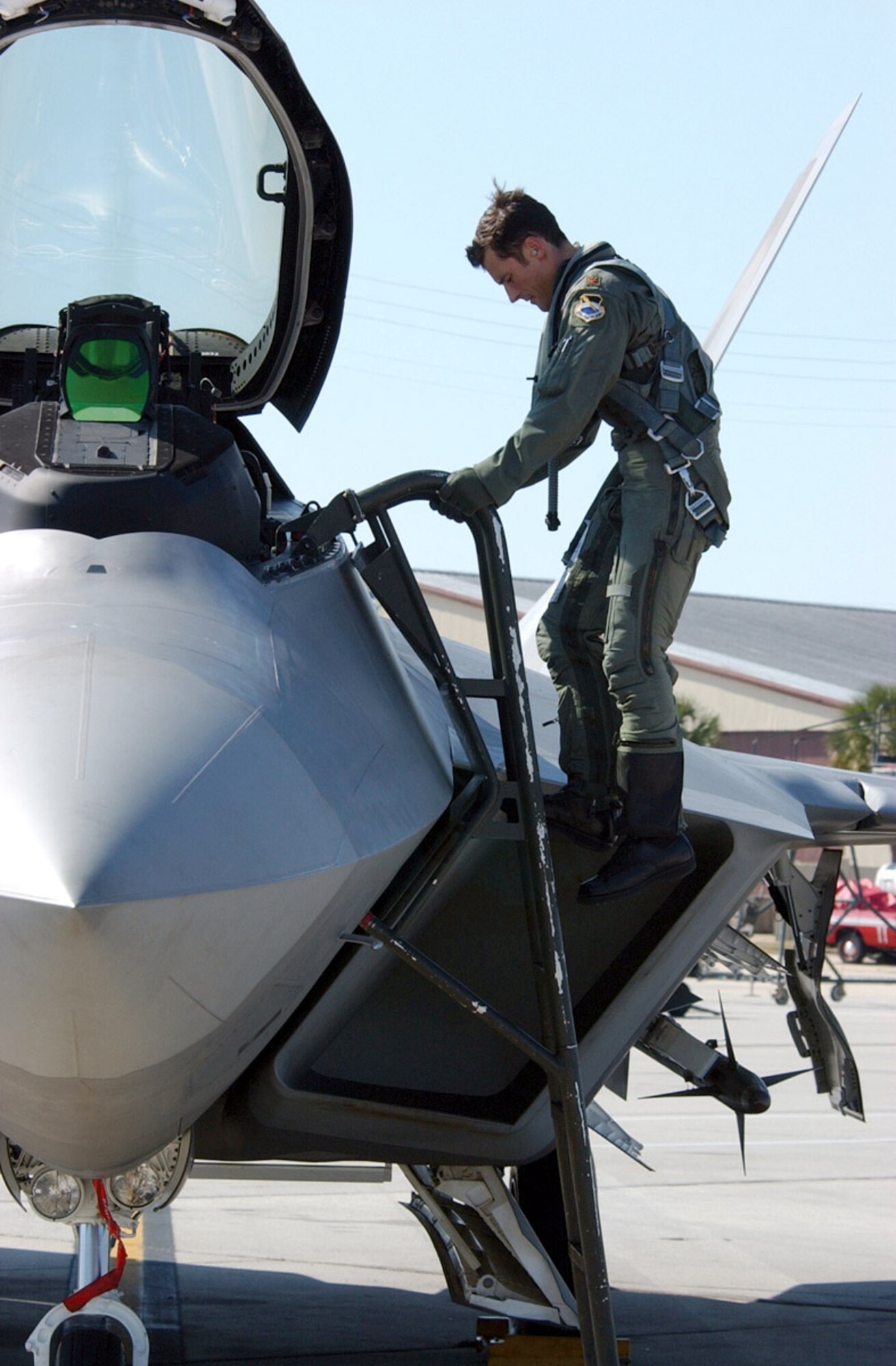 TYNDALL AIR FORCE BASE, Fla. (AFPN) -- Maj. Paul Moga returns from a flight at the completion of the "war."  Two F/A-22 Raptors joined 12 F-15 Eagles and a KC-135 Stratotanker to form the defensive counter air package, known as "Blue Air." (U.S. Air Force photo by 2nd Lt. William Powell) 