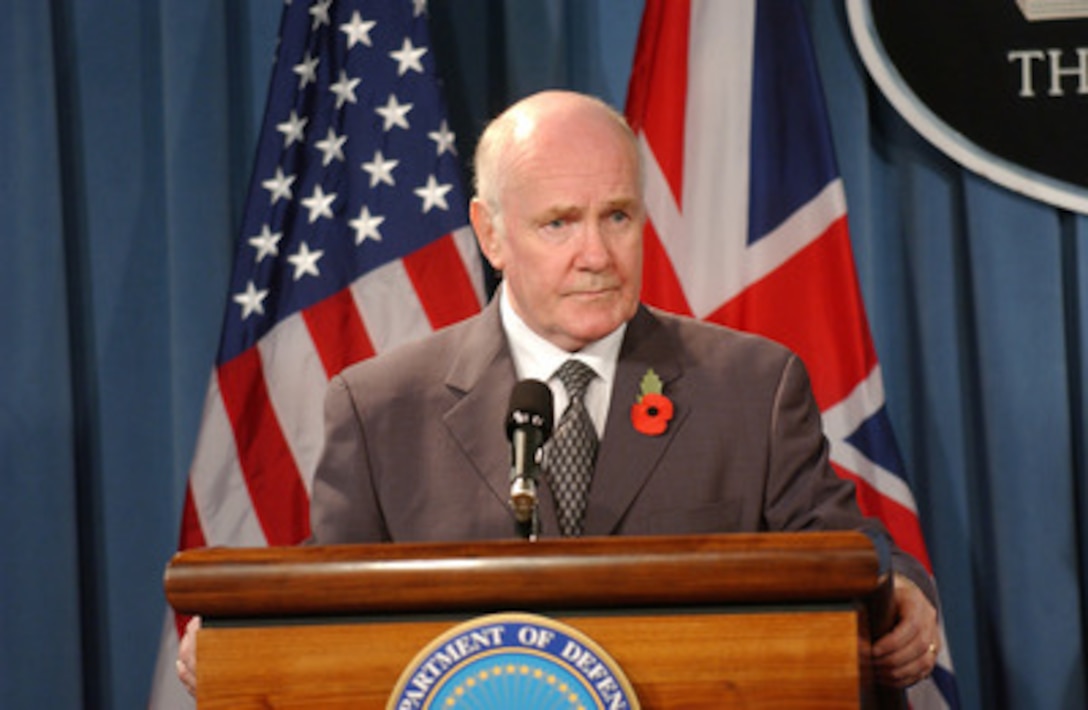 Secretary of State for Defense of the United Kingdom John Reid listens to a reporters question during a joint press briefing with Secretary of Defense Donald H. Rumsfeld in the Pentagon on Nov. 7, 2005. Reid and Rumsfeld briefed reporters on their meeting and discussed current military operations in Iraq. 