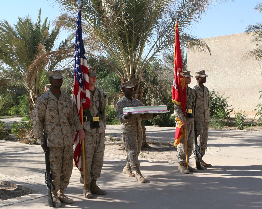 CAMP TAQADDUM, Iraq (Nov. 10, 2005) ? Lieutenant Col. David M. Smith cuts the cake at the Headquarters and Service Battalion Marine Corps birthday ceremony here Nov. 10. The Marines birthday celebration is something respected in every clime in place the Marine Corps goes today was no exception as the Marines of Headquarters and Service Battalion, 2nd Marine Logistics Group (Forward) gathered here to celebrated the 230th birthday of the United States Marine Corps. Smith is the commander of Headquarters and Service Battalion, 2nd MLG(Fwd).