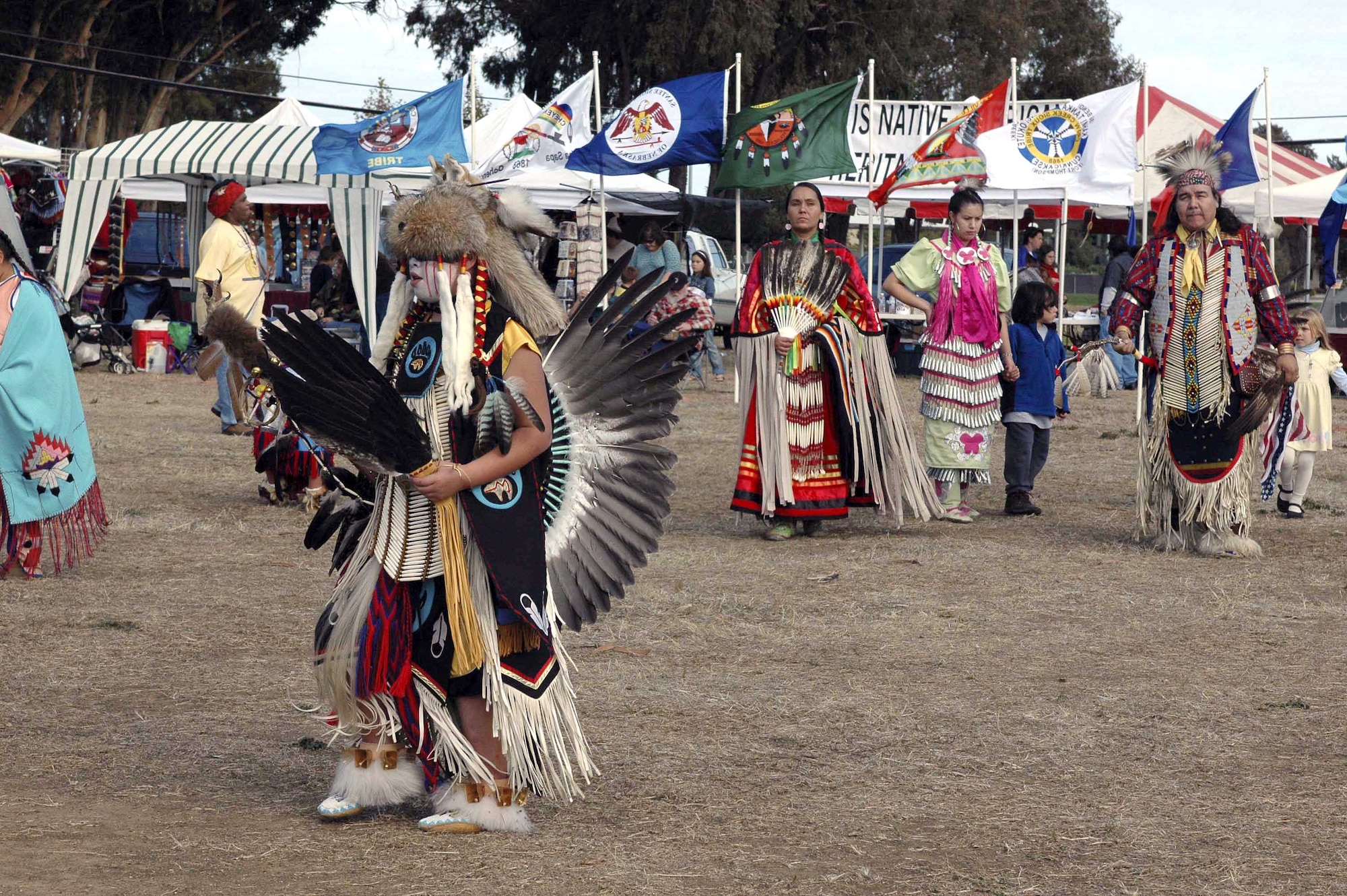 TRAVIS AIR FORCE BASE, Calif. (AFPN) -- Native Americans participate in a traditional dance during the fourth annual Veterans Pow Wow here. About 20 separate Native American nations were represented in the two-day event Nov. 5 and 6.  (U.S. Air Force photo by Airman 1st Class Tiffany Low)