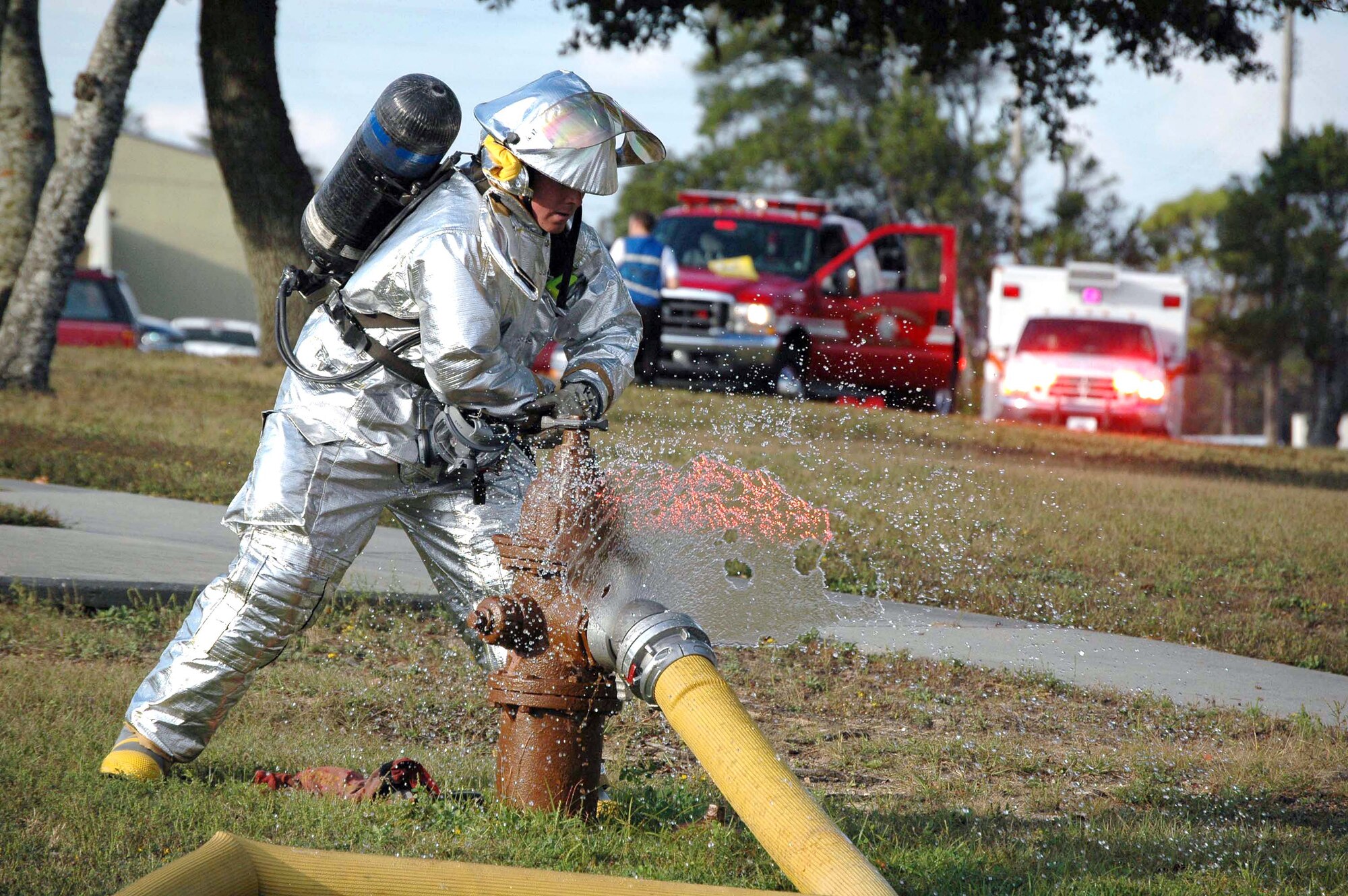 EGLIN AIR FORCE BASE, Fla. (AFPN) -- Firefighter Staff Sgt. Jeremy Rath turns on a fire hydrant to fill a fire truck with water during a fire alarm response at the health and wellness center here. The 96th Civil Engineer Squadron's Station 1 responded when the sprinkler system came on inside the sauna room Nov. 7. Fortunately, there was no fire. (U.S. Air Force photo by Senior Airman Mike Meares)