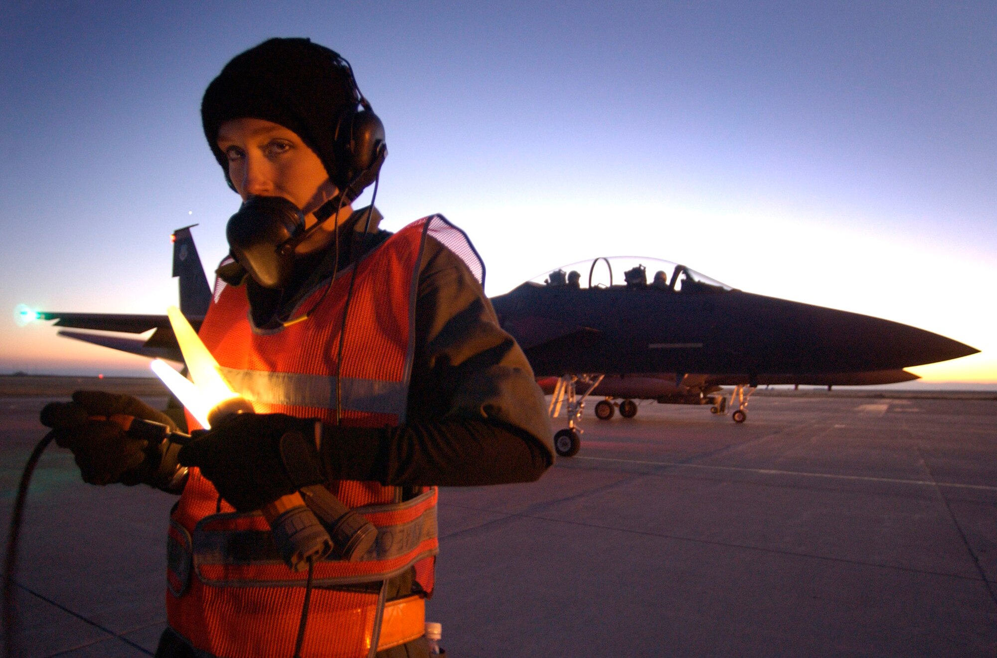 MOUNTAIN HOME AIR FORCE BASE, Idaho (AFPN) -- Senior Airman Tamara Rhone and fellow maintainers and weapons loaders do the final preflight inspection on an F-15E Strike Eagle before takeoff. Airman Rhone is a crew chief assigned to the 391st Aircraft Maintenance Unit. (U.S. Air Force photo by Master Sgt. Scott Wagers)
