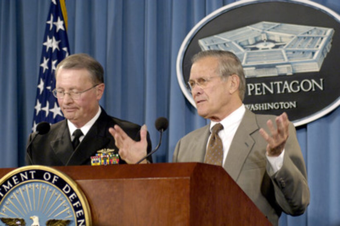 Secretary of Defense Donald H. Rumsfeld answers a reporter's question during a press briefing with Vice Chairman of the Joint Chiefs of Staff Adm. Edmund P. Giambastiani, U.S. Navy, in the Pentagon on Nov. 15, 2005. Rumsfeld and Giambastiani briefed reporters on the progress of operations in Iraq. 
