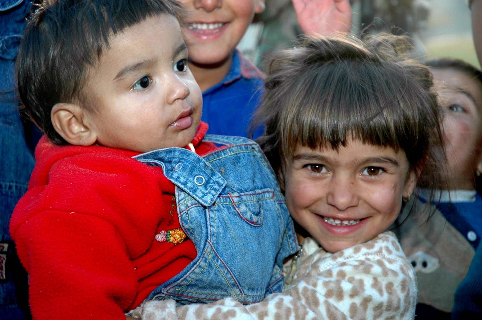 NOVO BRDO, Kosovo (AFPN) -- Children from the Novo Brdo region gather around for gifts and candy during a U.S. Headquarters Kosovo Force humanitarian visit. (Ukranian Army photo by 1st Lt. Maksym Nedria) 
