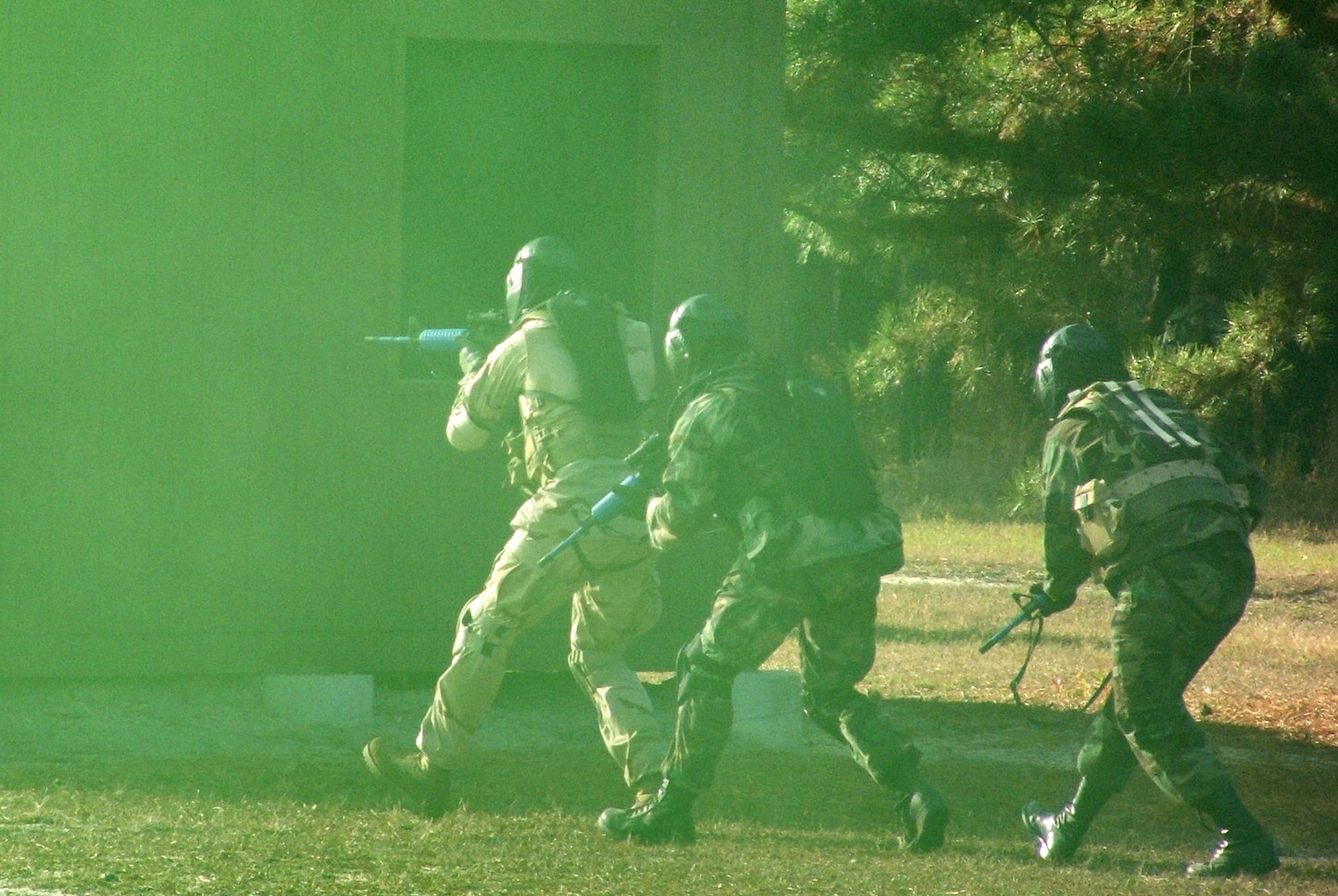 FORT DIX, N.J. (AFPN) -- Airmen participating in contingency skills training for the Combat Interrogator Course 06-1 move together during a scenario for close quarters battle. The class was taught by the 421st Combat Training Squadron at the Air Mobility Warfare Center, Fort Dix, Nov. 14. (U.S. Air Force Photo by Tech. Sgt. Scott T. Sturkol)