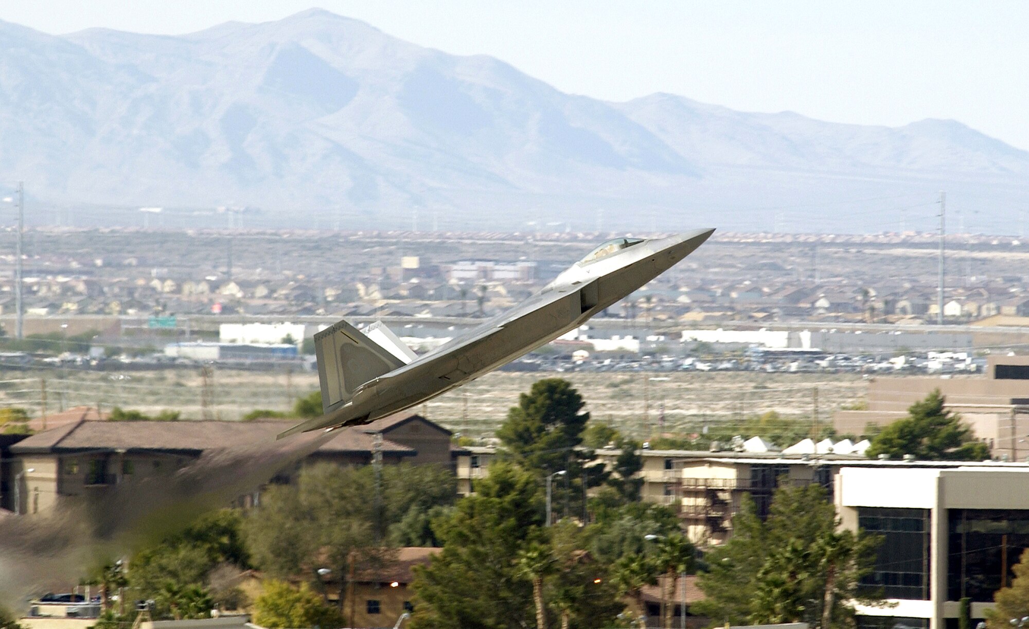 NELLIS AIR FORCE BASE, Nev. (AFPN) -- An F/A-22 Raptor aircraft takes off for a demonstration flight during the Aviation Nation 2005 air show. This year's event, held Nov. 12 and 13, was dedicated to Vietnam War veterans with a special welcome home tribute. It drew more than 150,000 spectators. (U.S. Air Force photo by Tech. Sgt. Demetrius Lester)