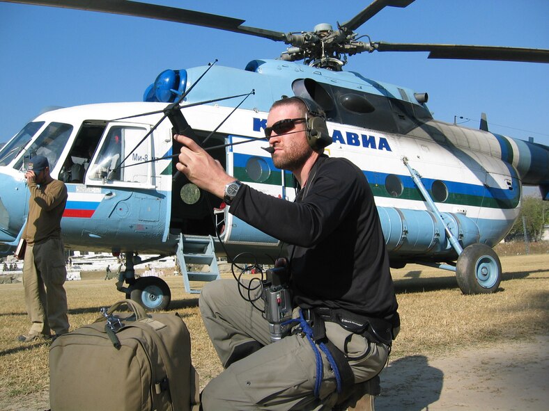 ISLAMABAD, PAKISTAN (AMCNS) – Pararescueman Tech. Sgt. Chris Robertson, attempts to contact his command unit in Islamabad, Pakistan.  Pararescuemen from the 212th Rescue Squadron at Kulis Air National Guard Base in Anchorage, Alaska, are supporting the humanitarian relief operation in Pakistan. (Photo by 1st Lt. Erick Saks)
