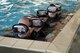 MOODY AIR FORCE BASE, Ga. (AFPN) -- Six combat rescue officer candidates huddle in the corner of a indoor pool as part of the water confidence test during a recent CRO selection board. (U.S. Air Force photo by Staff Sgt. Manuel Martinez)
