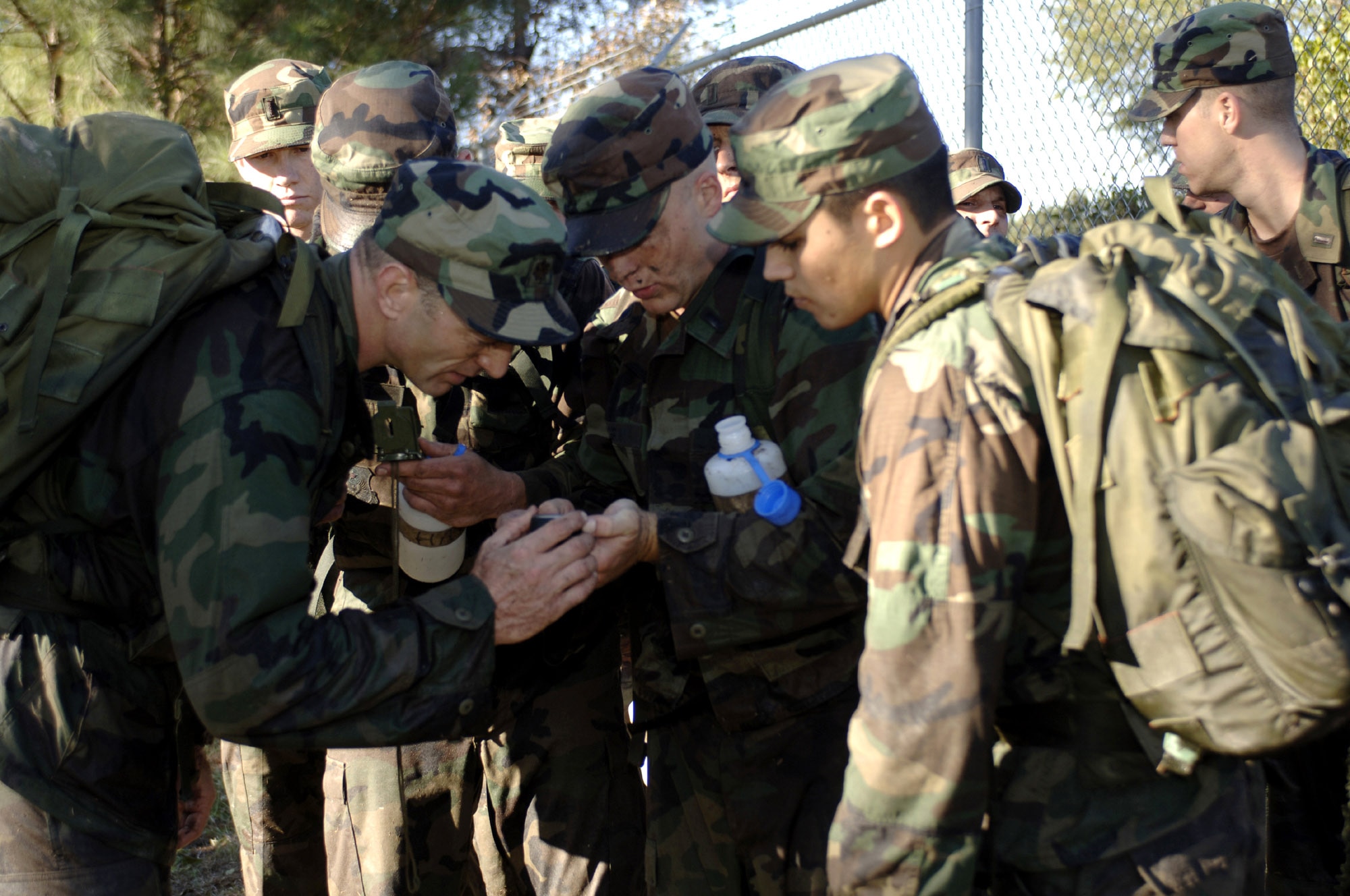 MOODY AIR FORCE BASE, Ga. (AFPN) -- Combat rescue officer candidates demonstrate their abilities to utilize a global positioning system device during a CRO selection board. They were given the task of finding litters scattered throughout the woods of the base's fitness trail. (U.S. Air Force photo by Staff Sgt. Manuel Martinez)
