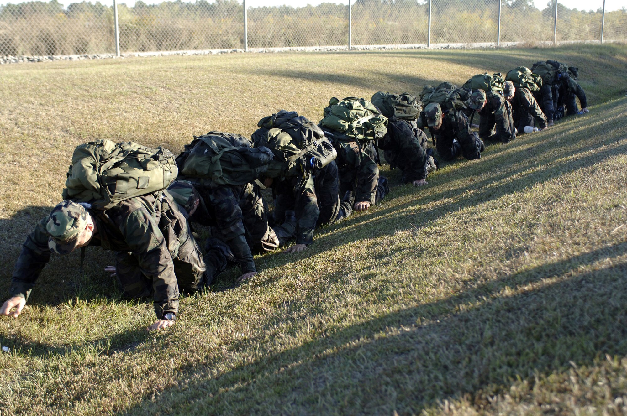 MOODY AIR FORCE BASE, Ga. (AFPN) -- Ten combat rescue officer candidates test their endurance during a series of events including a six-mile formation run and a four-mile minimum road march with 40-pound rucksacks. These events ensure each candidate meets the stringent requirements of a CRO's duties. (U.S. Air Force photo by Staff Sgt. Manuel Martinez)