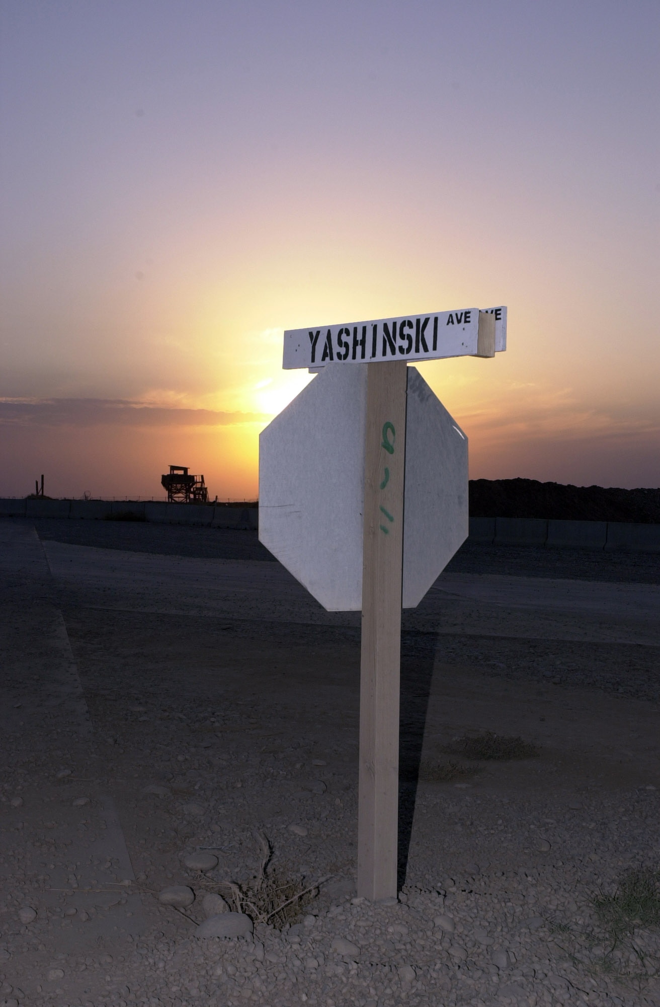 KIRKUK AIR BASE, Iraq (AFPN) -- A street sign named for Army Sgt. Michael E. Yaschinski stands at an intersection. Yaschinski Ave. is one of the streets named to after fallen Soldiers and Airmen of Kirkuk Regional Air Base and Forward Operating Base Warrior. (U.S. Air Force photo by Tech. Sgt. Ken Sloat) 