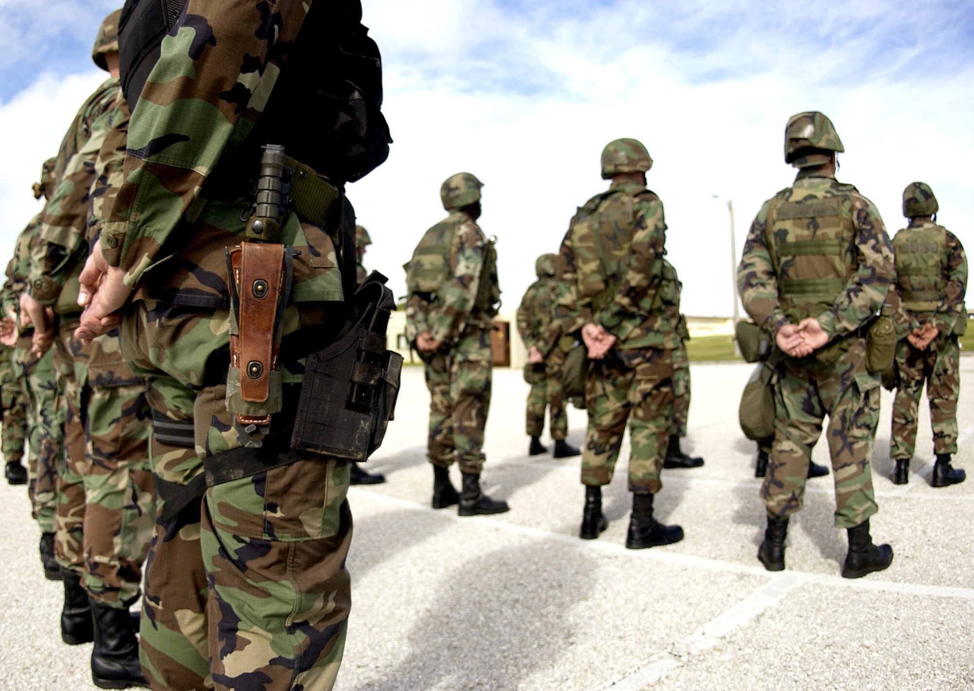 ANDERSEN AIR FORCE BASE, Guam (AFPN) - Airmen with the 36th Civil Engineer Squadron stand in formation during an open ranks inspection.  The squadron holds regular inspections to ensure that troops have all of their necessary equipment for deployment. (U.S. Air Force photo by Airman 1st Class Miranda Moorer)