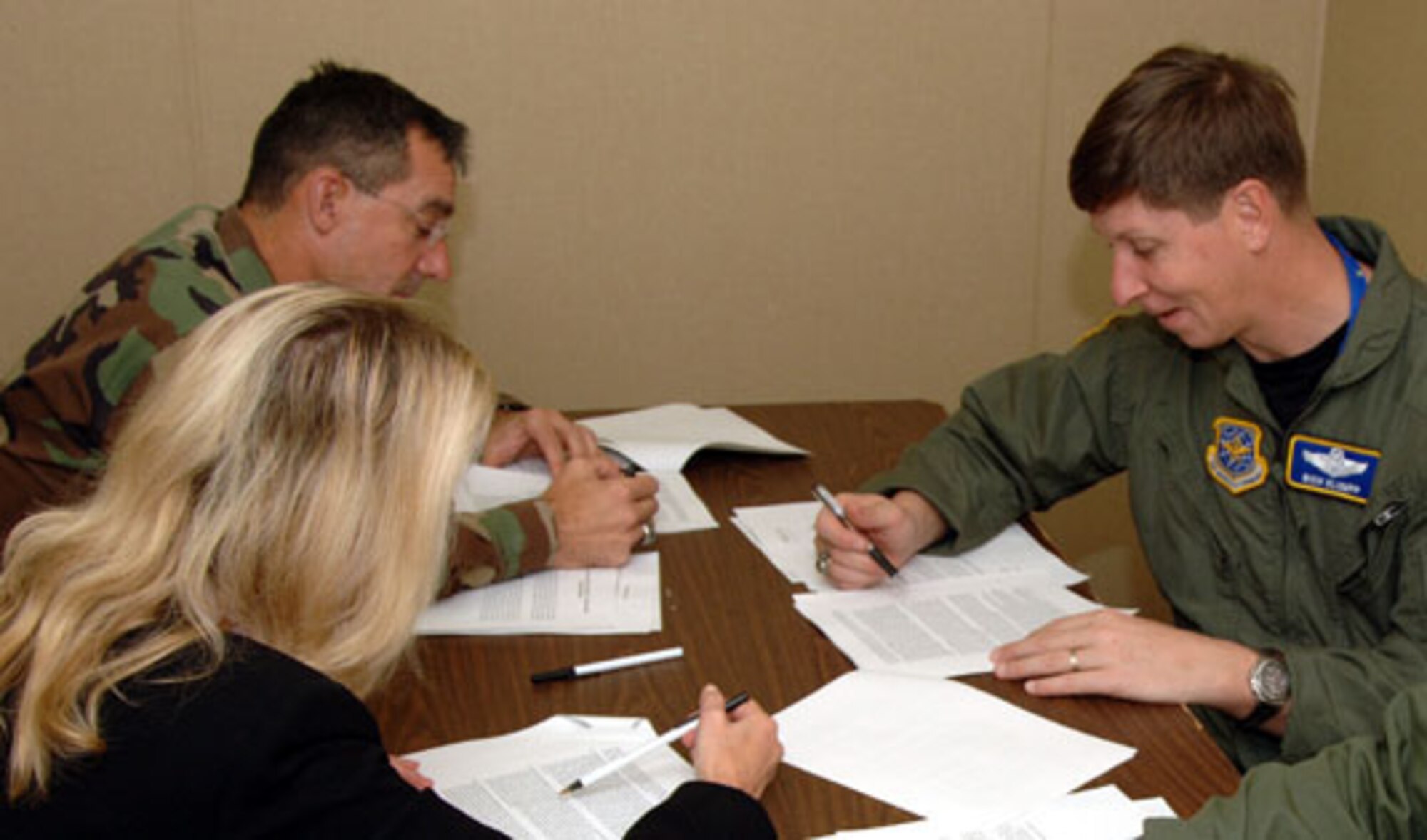 Col. Richard Klumpp, 375th Airlift Wing vice commander, and Col. Fred Ryder, 375th Mission Support Group commader, were amoung the first people to sign their lease Monday.