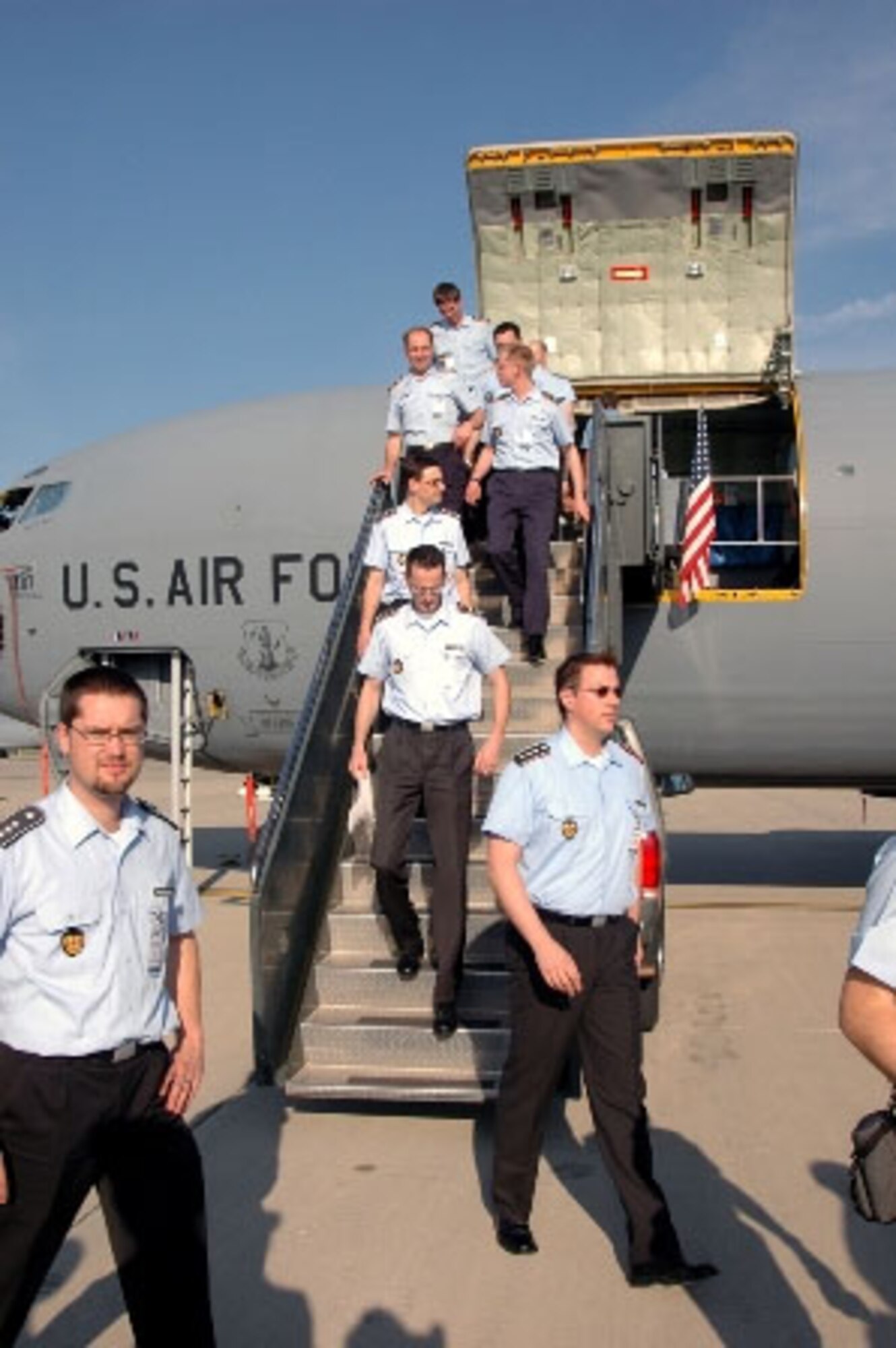 German Youth Information Officers disembark an Air National Guard KC-135 "Stratotanker" aircraft during a static display from the 126 ARW at Scott AFB, IL. (Mr. Marv Lynchard/375 AW/PA)