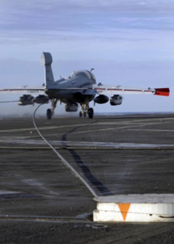 An EA-6B Prowler aircraft catches one of the four arresting wires on the flight deck of the aircraft carrier USS Enterprise (CVN 65) as the ship conducts flight operations in the Atlantic Ocean on Nov. 17, 2005. Enterprise and its embarked Carrier Air Wing 1 are underway in the Atlantic to conduct tailored ship's training. The all-weather Prowler provides protection for strike aircraft, ground troops and ships by jamming enemy radar, electronic data links, communications and obtains tactical electronic intelligence within the combat area. 