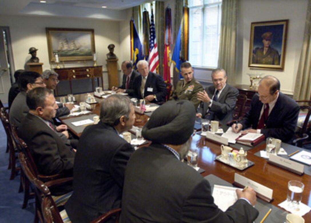 Secretary of Defense Donald H. Rumsfeld (2nd from right) hosts a Pentagon meeting with India's Defense Secretary Shekhar Dutt (center left) on Nov. 22, 2005. U.S. Ambassador to India David Mulford (4th from right), Chairman of the Joint Chiefs of Staff Gen. Peter Pace (3rd from right) and Under Secretary of Defense for Policy Amb. Eric Edelman (right) joined Rumsfeld for his talks with Dutt. The meeting was part of the U.S.- India Defense Policy Group. 