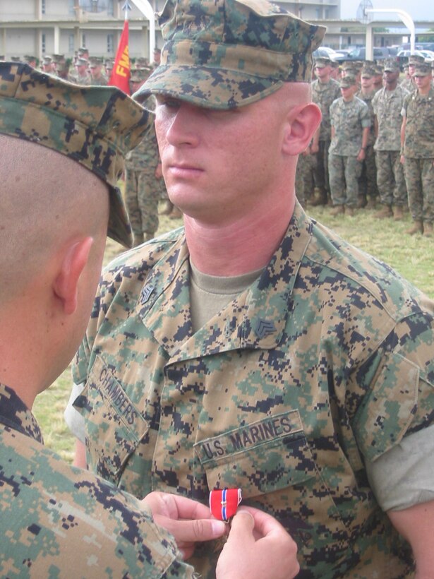 Sgt. Michael Chambers a 1/3 rifleman and Charlie Company platoon sergeant for 3rd Platoon, received his Bronze Stars with the V device for his heroic actions during the battle for Fallujah in a ceremony, Nov. 21, aboard Marine Corps Base Hawaii, Kaneohe Bay.