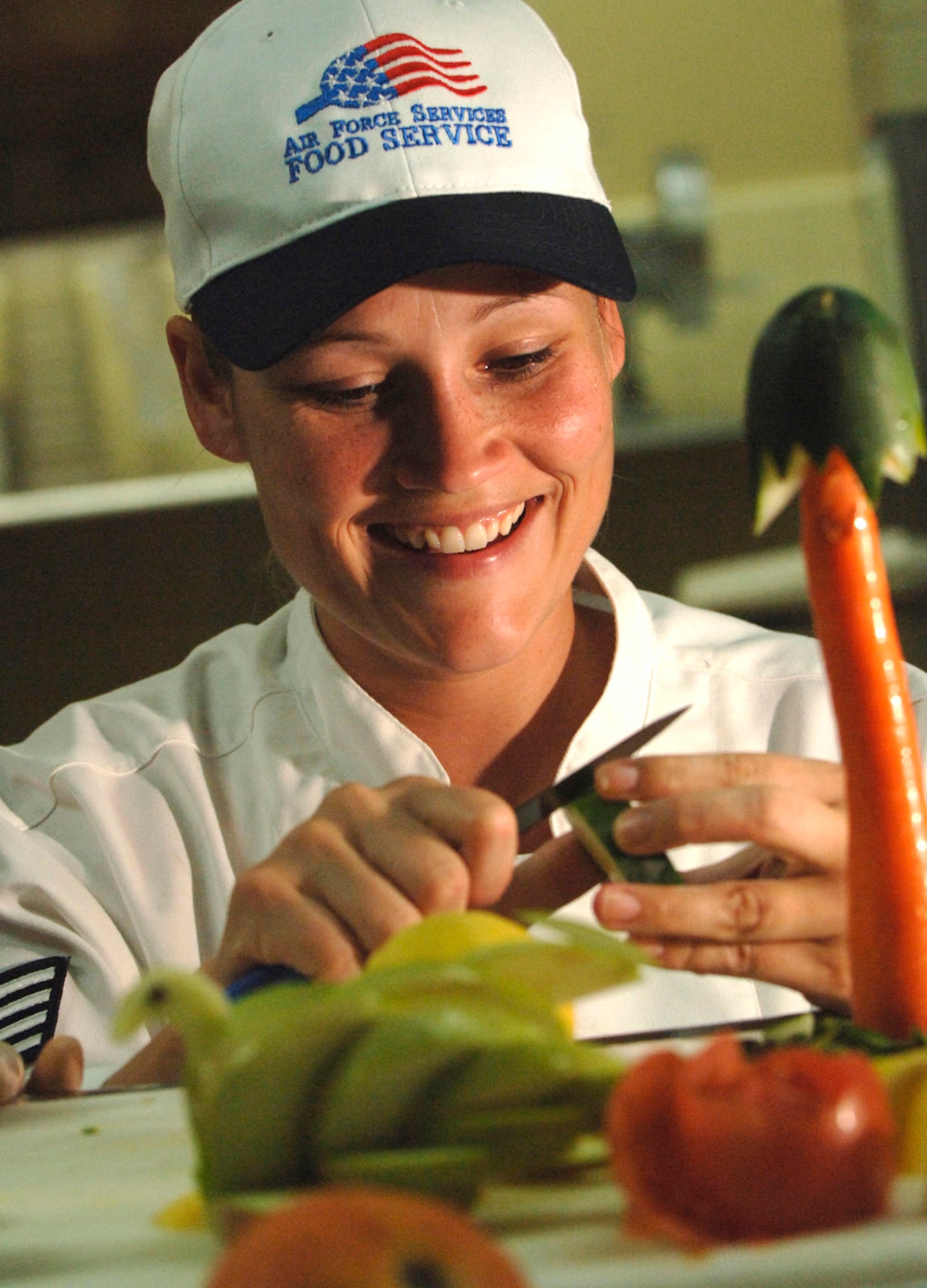 ANDERSEN AIR FORCE BASE, Guam (AFPN) -- Staff Sgt. Tina Ross carves vegetables for the Thanksgiving festivities here. She is assigned to the 36th Services Squadron. (U.S. Air Force photo by Tech. Sgt. Cecilio Ricardo Jr.)
