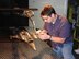 ARNOLD AIR FORCE BASE, Tenn. (AFMCNS) -- Adam Plondke, store separation project engineer, inspects the installation of the 1/20-scale model of the Miniature Air-Launched Decoy and F-16. Wind tunnel testing, which investigated the carriage and separation characteristics of the MALD from the F-16 at speeds up to Mach 0.95, was recently completed in the 4T wind tunnel. Use of the low-cost, air-launched, programmable decoys, which can accurately replicate the combat flight profiles and signatures of U.S. and coalition aircraft, is designed to deceive and confuse adversary air defense systems. (Air Force photo by Doyle Veazey)