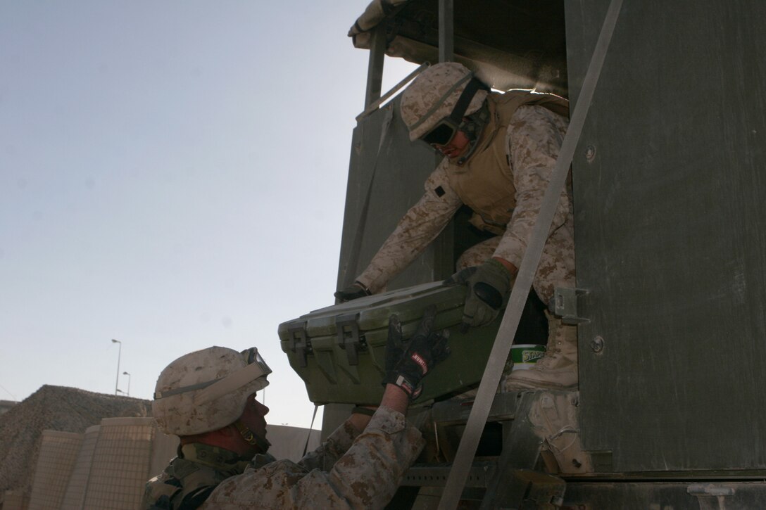 CAMP TAQADDUM, Iraq (Nov. 24, 2005) ? A Marine stretches before participating in the Thanksgiving Turkey Trot 10 kilometer run, here Nov. 24. The event reached out to nearly 100 Marines, Soldiers, Sailors and numerous civilian employees. Corporal Jeremy R. Kerstein, a supply administration clerk with Marine Wing Support Squadron-372, crossed the finish line in first place at 37 minutes, 40 seconds.