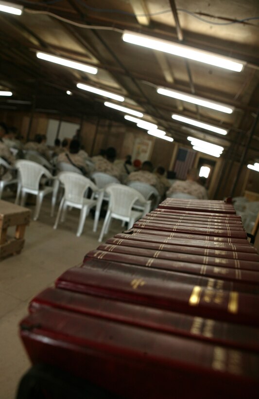 CAMP TAQADDUM, Iraq (Nov. 24, 2005) ? A row of bibles rest in the back of the chapel while service members of all branches and commands attend a special service, here Nov. 24. Other events throughout the day included a 10 kilometer run, and a traditional Thanksgiving feast.