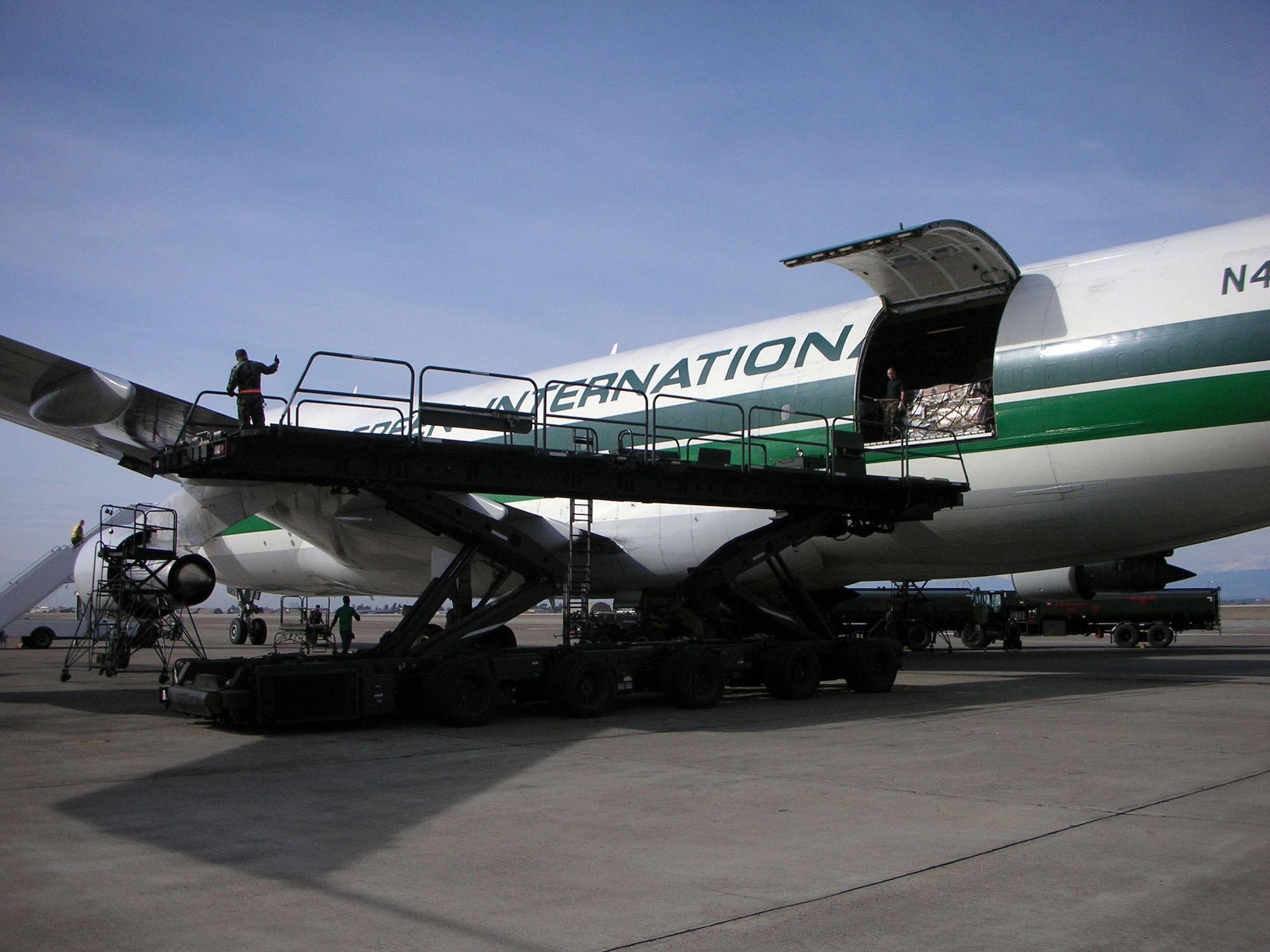 INCIRLIK AIR BASE, Turkey (AFPN) -- A military-contracted 747 Jumbo Jet is unloaded by Incirlik's aerial porters of the 728th Air Mobility Squadron. With about 100 deployed reservists working around the clock, Incirlik Air Base is the main airlift hub for moving cargo into Iraq. (U.S. Air Force photo by Lt. Col. Bob Thompson)
