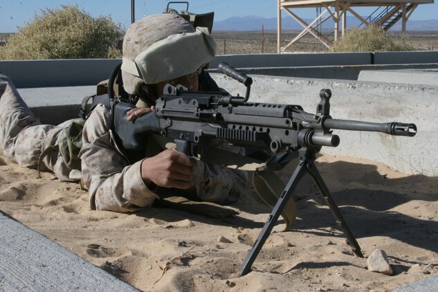 Lance Cpl. Matthew F. Shipley, motor transportation driver with Headquarters Company, 7th Marine Regiment, takes aim on Combat Center Range 103 Nov. 30.  The 20-year-old Philadelphia native has been assigned to the company?s provisional rifle platoon and is broadening his combat skills for their upcoming deployment.