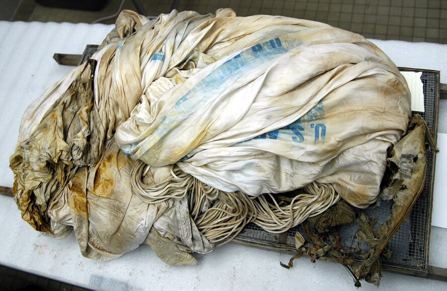 HICKAM AIR FORCE BASE, Hawaii (AFPN) -- Joint POW/MIA Accounting Command scientists are working to identify an Airman who was found Oct. 16 on Mount Mendel in Kings Canyon National Park, Calif.  The unidentified Airman arrived at JPAC Oct. 24 still wearing a World War II-era parachute, with a comb, various coins and other personal effects in his pockets. Investigators at JPAC searched the records of men lost during World War II and found that between 25 and 30 military planes crashed on training missions in California during these years. They have narrowed the list of possible Airmen to four who disappeared during a training mission on Nov. 18, 1942. (U.S. Air Force photo by Staff Sgt. Derrick C. Goode)