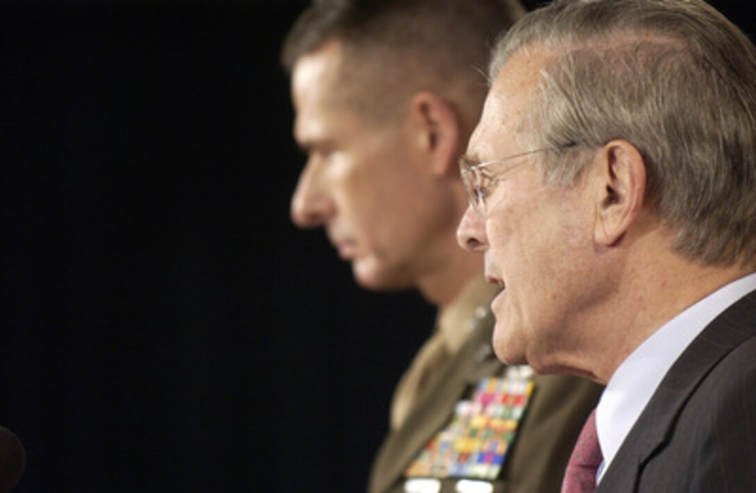 Secretary of Defense Donald H. Rumsfeld responds to a reporter's question during a press briefing in the Pentagon on Nov. 29, 2005. Rumsfeld and Chairman of the Joint Chiefs of Staff Gen. Peter Pace, U.S. Marine Corps, updated reporters on current operations and some of the progress of Iraqis in taking control of their country. 