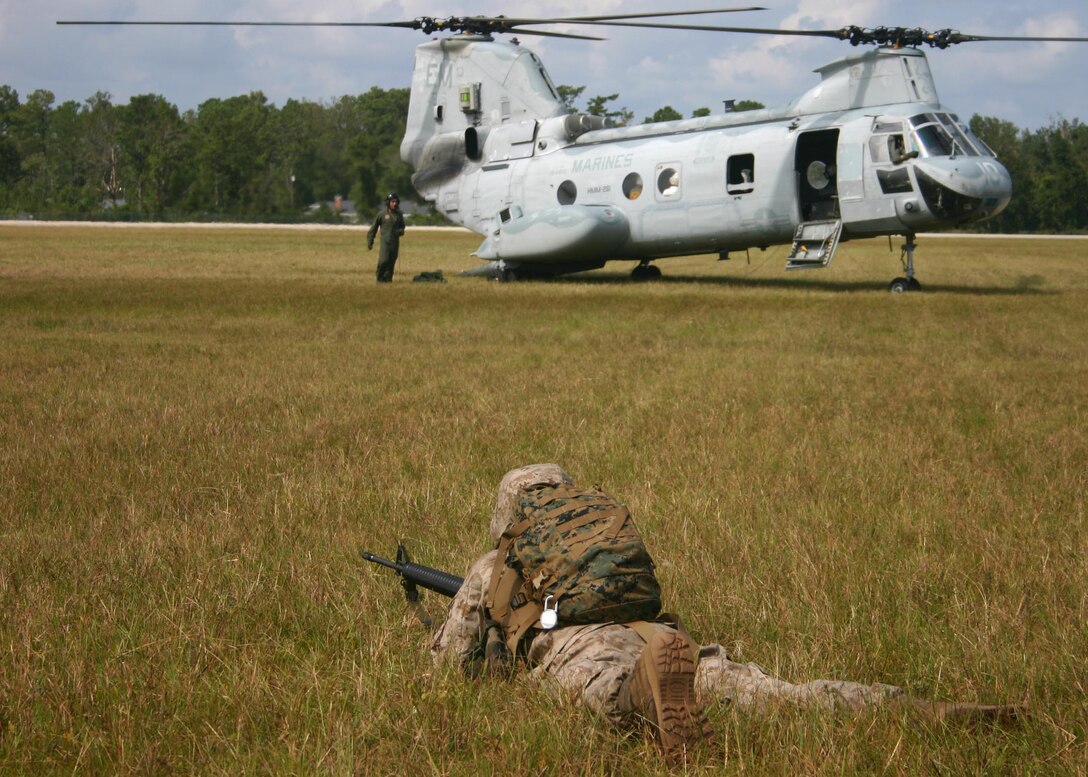 A Marine with Battalion Landing Team 1st Bn., 2nd Marines, the ground combat element of the 22nd Marine Expeditionary Unit, provides security for a helicopter landing zone during a mass casualty exercise aboard Camp Lejeune, Oct. 1, 2005.  The exercise was part of the MEU's recent Certification Exercise (CERTEX), and the MEU's final predeployment hurdle.