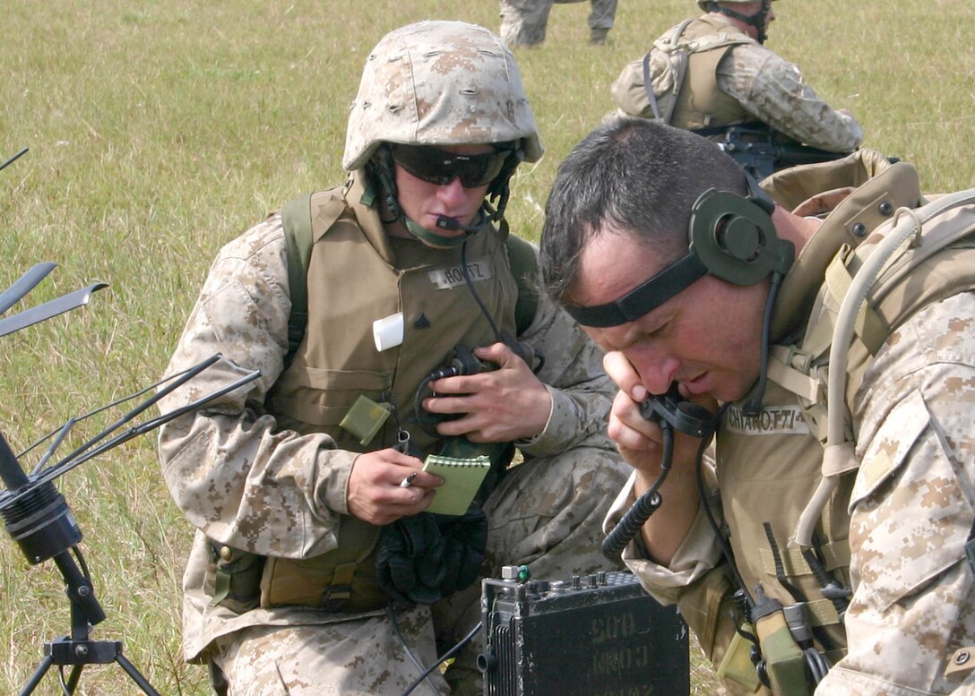 Lt. Col. Charles Chiarotti, the commanding officer of MEU Service Support Group 22, radios in a situation report during a recent mass casualty exercise conducted as part of a recent Certification Exercise (CERTEX), Oct. 1, 2005.  CERTEX was the final predeployment training exercise for the 22nd Marine Expeditionary Unit (MEU).