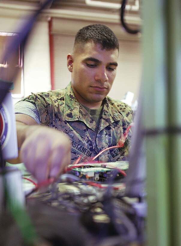 Cpl. Matthew Castaneda, 23, an electronics technician with 1st Maintenance Battalion, 1st Force Service Support Group, helped save an elderly woman from a burning vehicle.