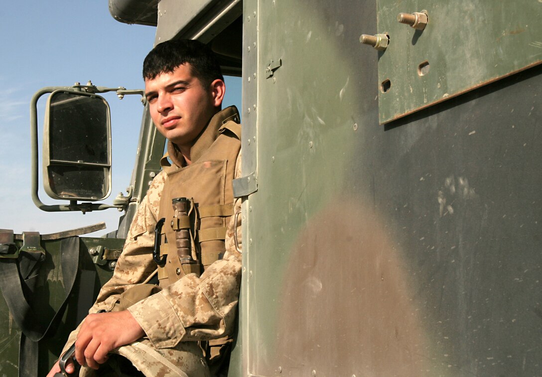Cpl. Daniel W. Phipps, ambulance driver, Battalion Aid Station, Combat Logistics Battalion 8, 2nd Force Service Support Group (FWD), stands in the CLB-8 BAS here Oct. 6. In the two years Phipps has been in the Corps, he has been on three deployments, and recently volunteered to extend here.