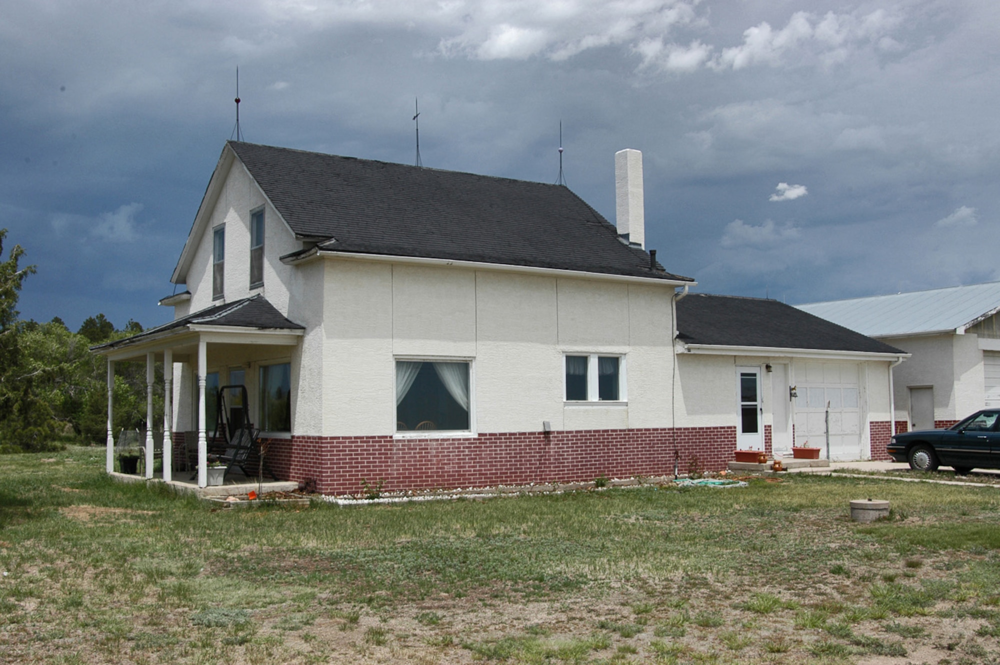 PEYTON, Colo. -- The Barrett's 101 year-old former home was demolished by the "Extreme Home Makeover" crew to make room for their new 4,000-square-foot home.  The ABC show aired nationally Oct. 2.  (U.S. Air Force photo by James Lovely)       