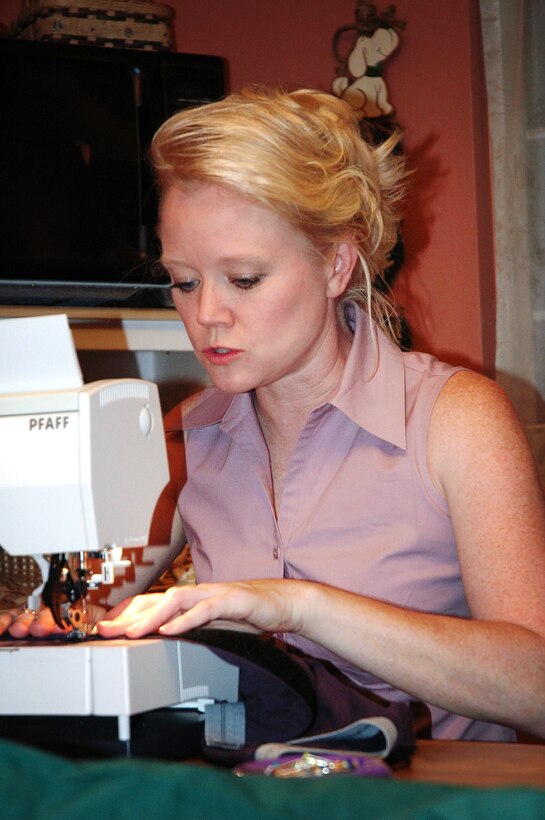 Volunteers give comfort by sewing