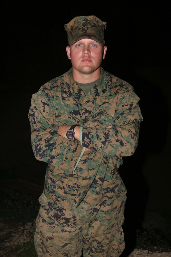 Sgt. Andrew K. Jones, Scout Sniper instructor, takes time out from training Marine scout snipers to pose for the camera at Schofield Barracks, Oct. 7.