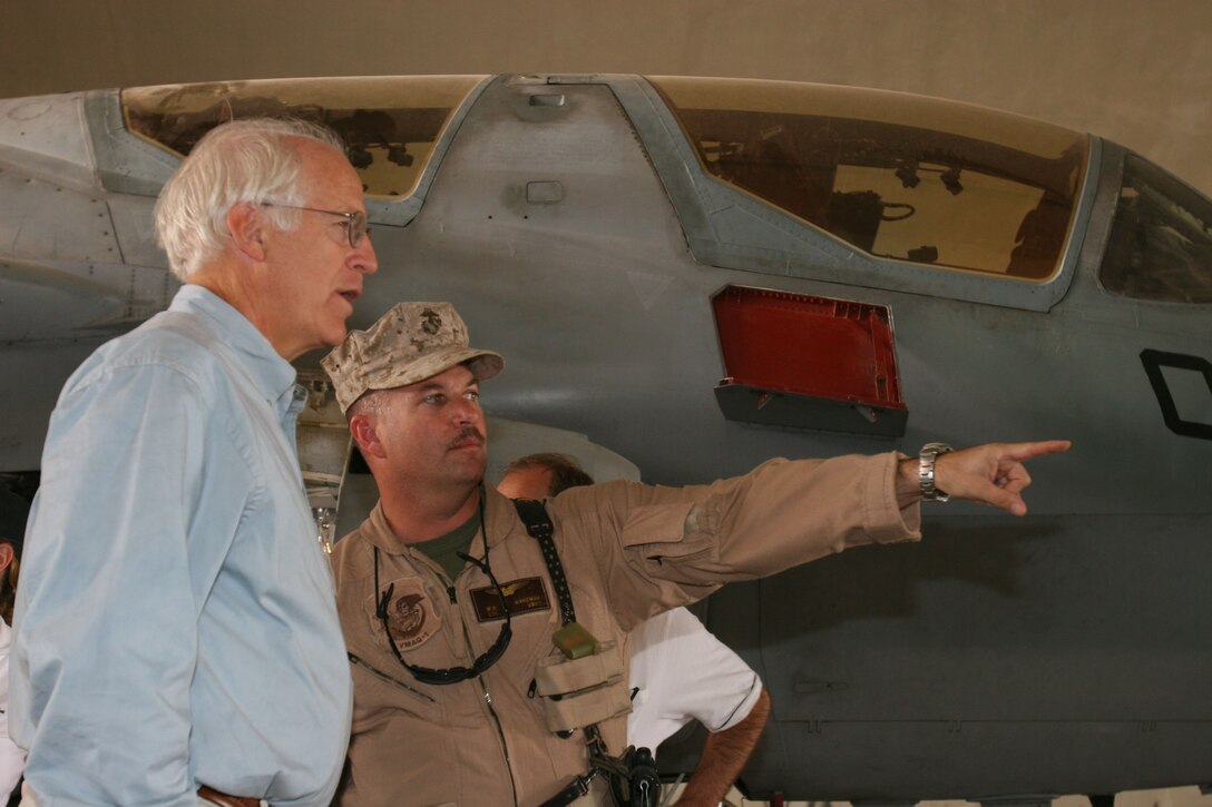 United States Rep. Christopher Shays talks about the mission of Marine Tactical Electronic Warfare Squadron 1 with the squadron?s commanding officer, Col. Mark E. Wakeman, during a congressional delegation visit, Oct. 10, at Al Asad, Iraq. The congressmen from Connecticut, Massachusetts, North Dakota, New York, Wisconsin and American Samoa were briefed on 2nd Marine Aircraft Wing's progress and ongoing operations, visited the Fighting Griffins of Marine Medium Helicopter Squadron 266 and the Banshees of Marine Tactical Electronic Warfare Squadron 1 and had lunch with service members from their represented areas.