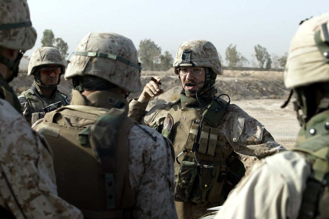 Sergeant Kurtis Young, an air traffic controller from Marine Air Control Squadron 1, Detachment C, identifies an aircraft inbound to the airfield, Oct. 10, at Al Asad, Iraq. Young, a Glendale, Ariz., native, is a member of the Al Asad ATC detachment which recently expanded its role from controlling aircraft in and around Al Asad, to broadcasting information via pictures across western Iraq. A Joint Interface Control Cell team from Al Udeid, Qatar, helped the Marines install and begin operating the tactical data links used to create and transmit a common tactical picture.