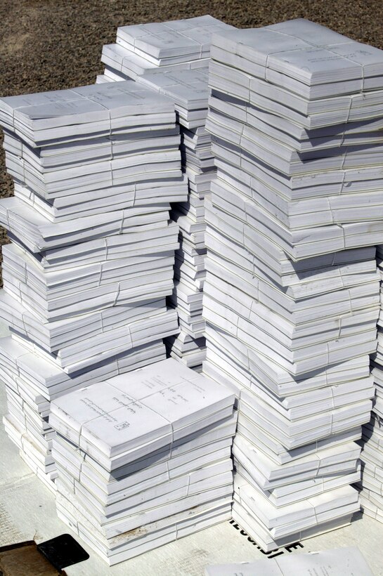 Lieutenant Tom Fowler (front) and Lt. John Lyon, serve up over 100 gallons of chili during the Combat Center Fire Department?s 8th annual chili luncheon at their department Oct. 14.  The event raised money for a large donation to help the victims of Hurricane Katrina.