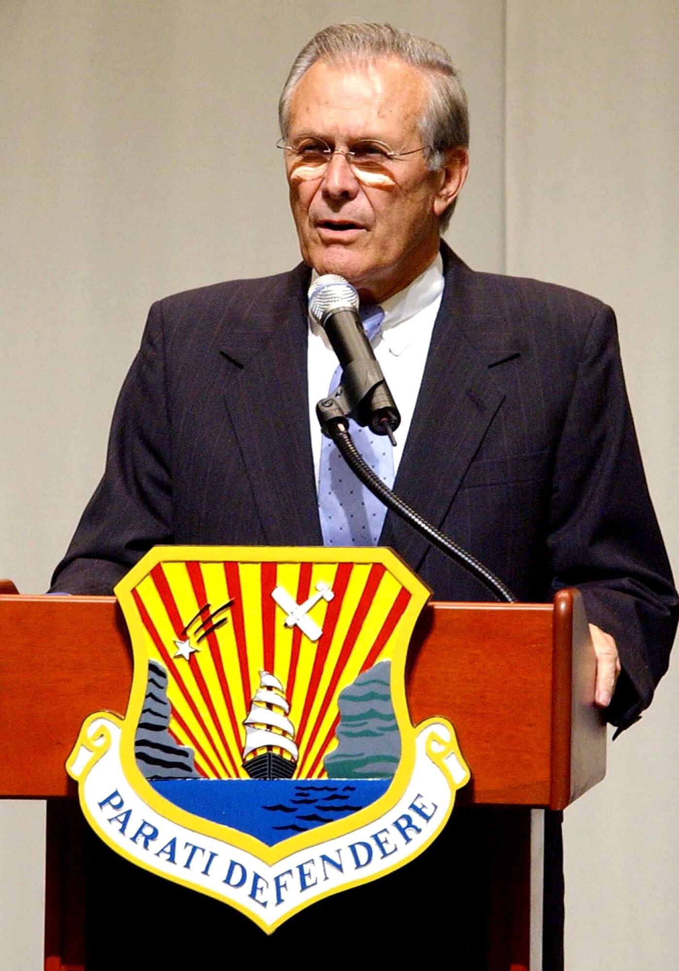MACDILL AIR FORCE BASE, Fla. -- Defense Secretary Donald H. Rumsfeld addresses questions during a town-hall meeting at the Davis Conference Center here.  He answered questions on issues from hurricane relief to the global war on terrorism. The secretary was at the base Oct. 11 to visit servicemembers and the staff at U.S. Central Command and U.S. Special Operations Command. (U.S. Air Force photo by Airman 1st Class Bradley Lail) 