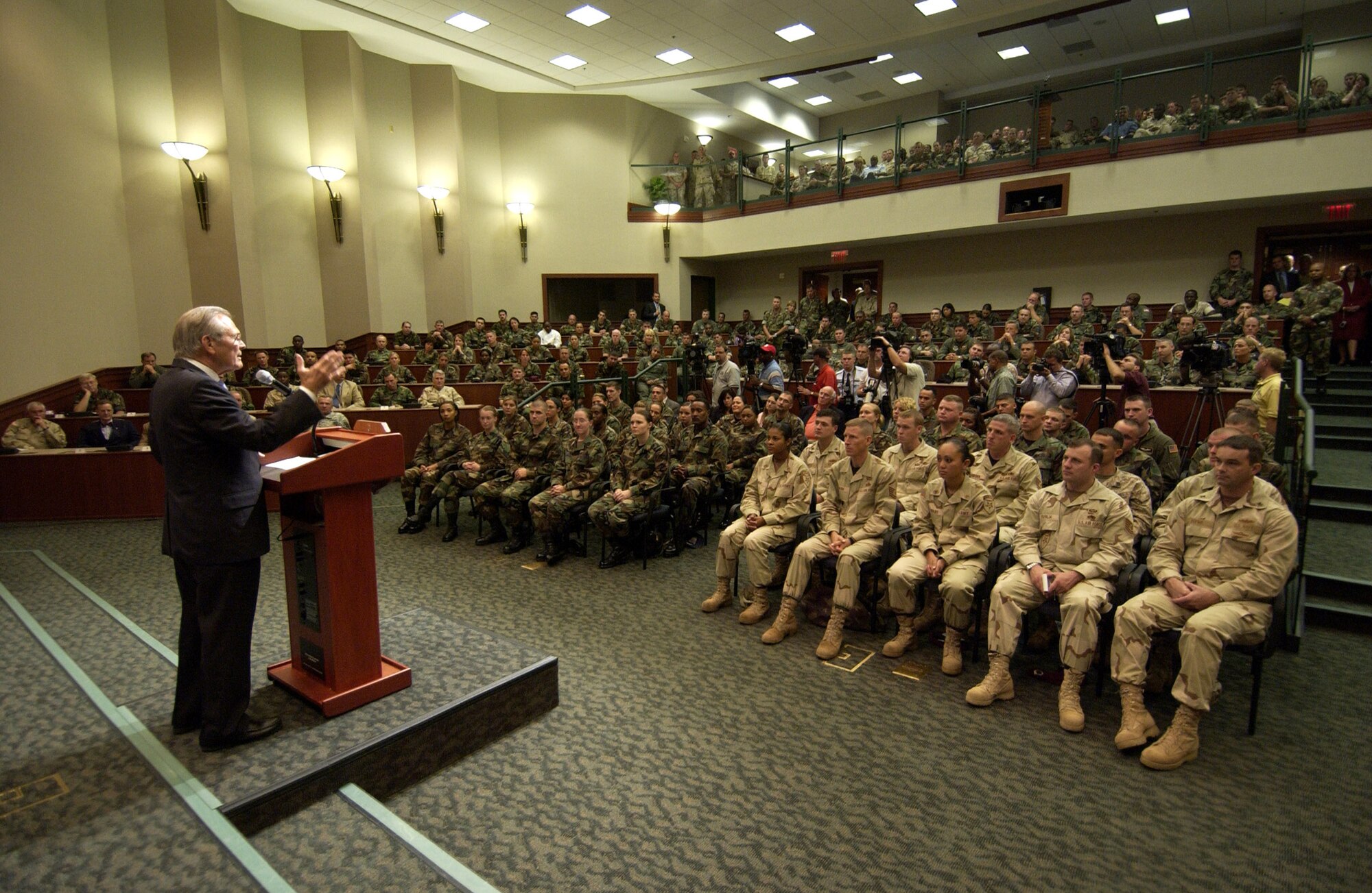 MACDILL AIR FORCE BASE, Fla. -- Secretary of Defense Donald H. Rumsfeld answers a question during a town hall meeting in the Davis Conference Center here. The secretary was at the base Oct. 11 to visit servicemembers and the staff at U.S. Central Command and U.S. Special Operations Command. (U.S. Air Force photo by Master Sgt. James M. Bowman)