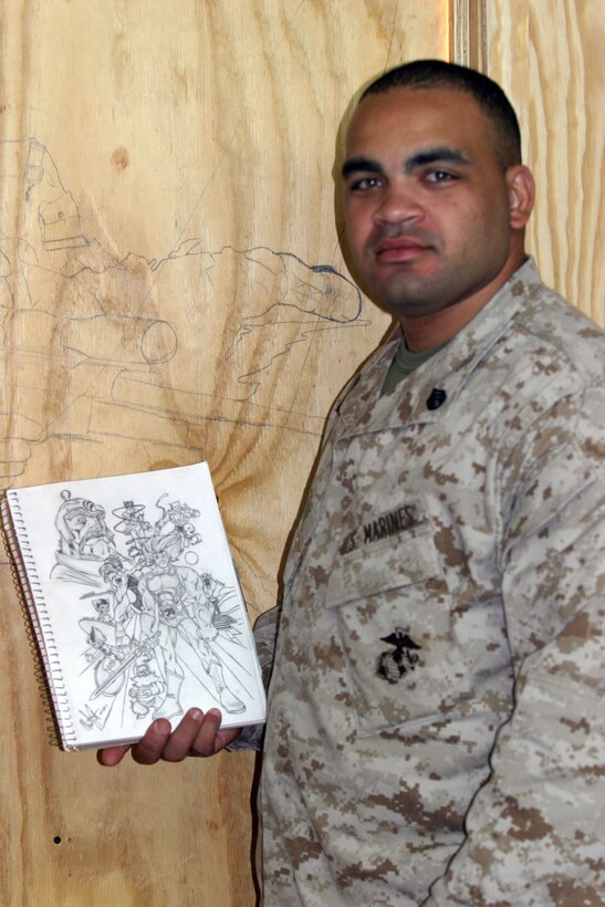 CAMP TAQADDUM, Iraq (Oct. 18, 2005) ? Staff Sgt. Charley Puente stands with his sketchbook in front a mural that is currently in progress at his office here. Puente has expressed his emotions through his art for many years. Puente is the SYSCOM staff-non commissioned officer in charge for Communications Company, Headquarters and Service Battalion, 2nd Force Service Support Group.