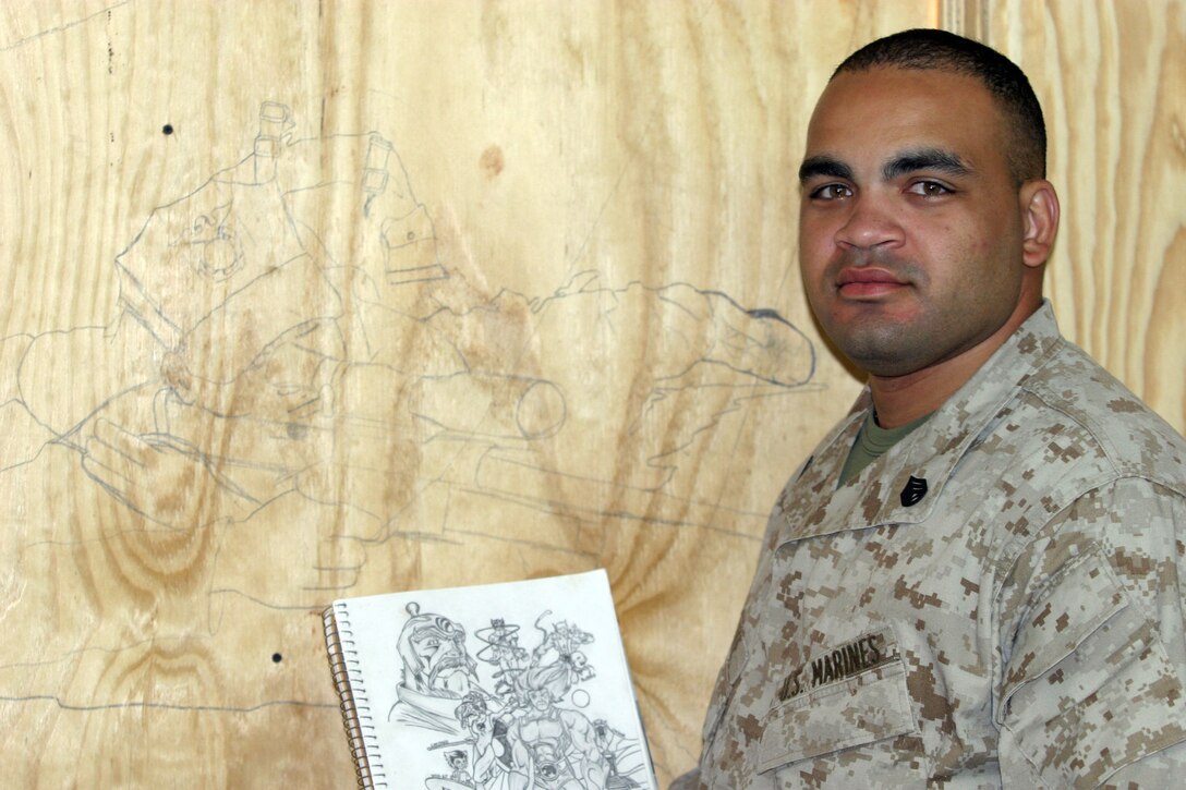 CAMP TAQADDUM, Iraq (Oct. 18, 2005) ? Staff Sgt. Charley Puente stands with his sketchbook in front a mural that is currently in progress at his office here. Puente has expressed his emotions through his art for many years. Puente is the SYSCOM staff-non commissioned officer in charge for Communications Company, Headquarters and Service Battalion, 2nd Force Service Support Group.