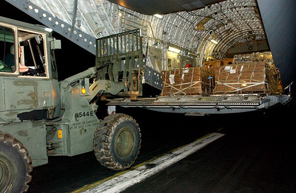 Islamabad, Pakistan --  Airman prepare to unload cargo here as part of the Pakistan earthquake relief effort.  The earthquake has killed an estimated 40,000 people and has left thousands more injured in Afganistan, Pakistan, India, and the Kashmir region.(USAF photo by Airman 1st Class De-Juan Haley)(Released)