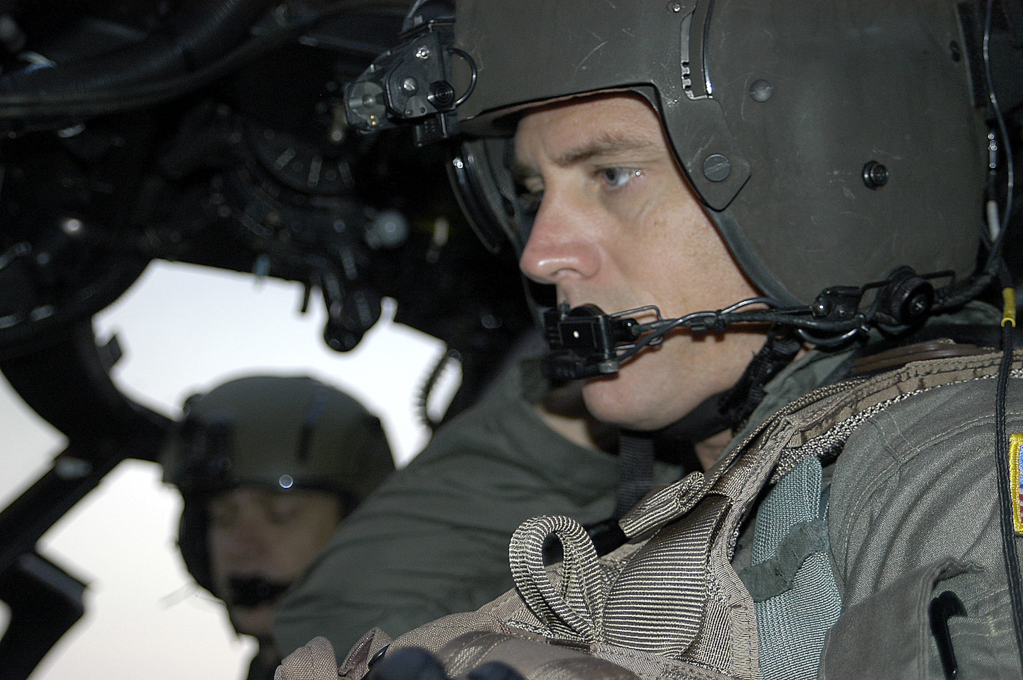 Maj. Tim Pfeifer, an Air Force reservist with the 920th Rescue Wing and commercial pilot with American Airlines, prepares his HH-60 Pave Hawk helicopter for another search for survivors in New Orleans Sept. 10.  Based out of Patrick Air Force Base, Fla., Major Pfeifer's crew is part of a Total Force team of AIr Force Reserve, Guard and active duty Airmen, who have saved more than 4,200 people. (Air Force photo by Senior Master Sgt. Elaine Mayo)