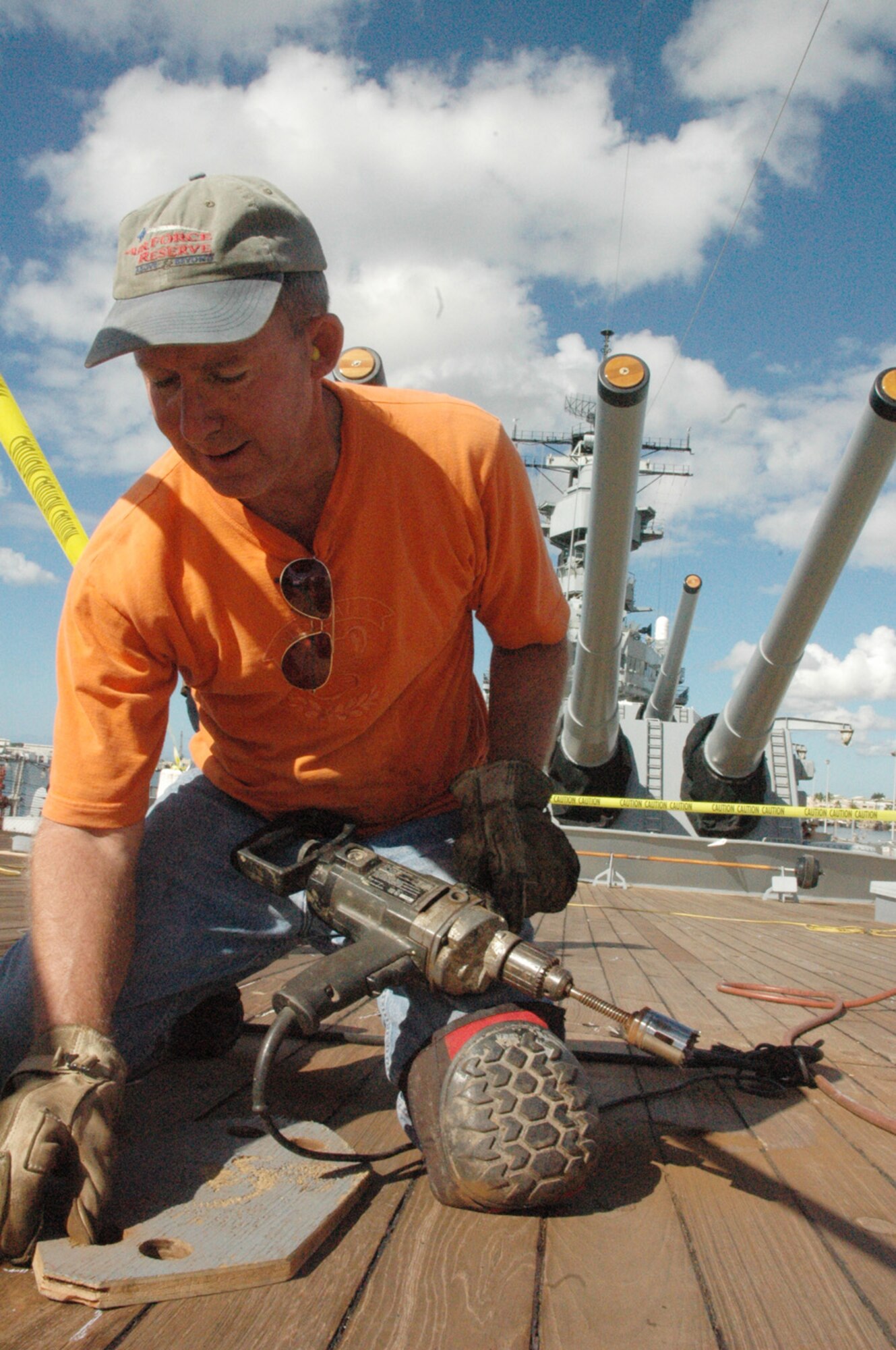 Air Force reservists volunteer for ship duty

050813-F-6504N-001 Staff Sgt. Robert Brown, an Air Force reservist with the 624th Civil Engineer Squadron, Hickam Air Force Base, Hawaii, prepares to drill out a deck plug on the teakwood deck of the USS Missouri. More than 100,000 deck plugs have been replaced since restoration of the Iowa-class battleship began in 1998. Sergeant Brown is one of many members of Air Force Reserve Commands 624th Regional Support Group, who have volunteered their time this summer to help restore the historic battleship docked at Ford Island, Oahu. Restoration efforts on the ship, popularly known as the "Mighty Mo," stepped up recently in anticipation of celebrations scheduled for Sept. 2, commemorating the 60th anniversary of its role as the site of Japan's unconditional surrender to Allied Forces, which ended World War II. Volunteer work on the USS Missouri is part of the 624th RSGs ongoing community outreach program. (U.S. Air Force photo by Tech. Sgt. Daniel Nathaniel)


  